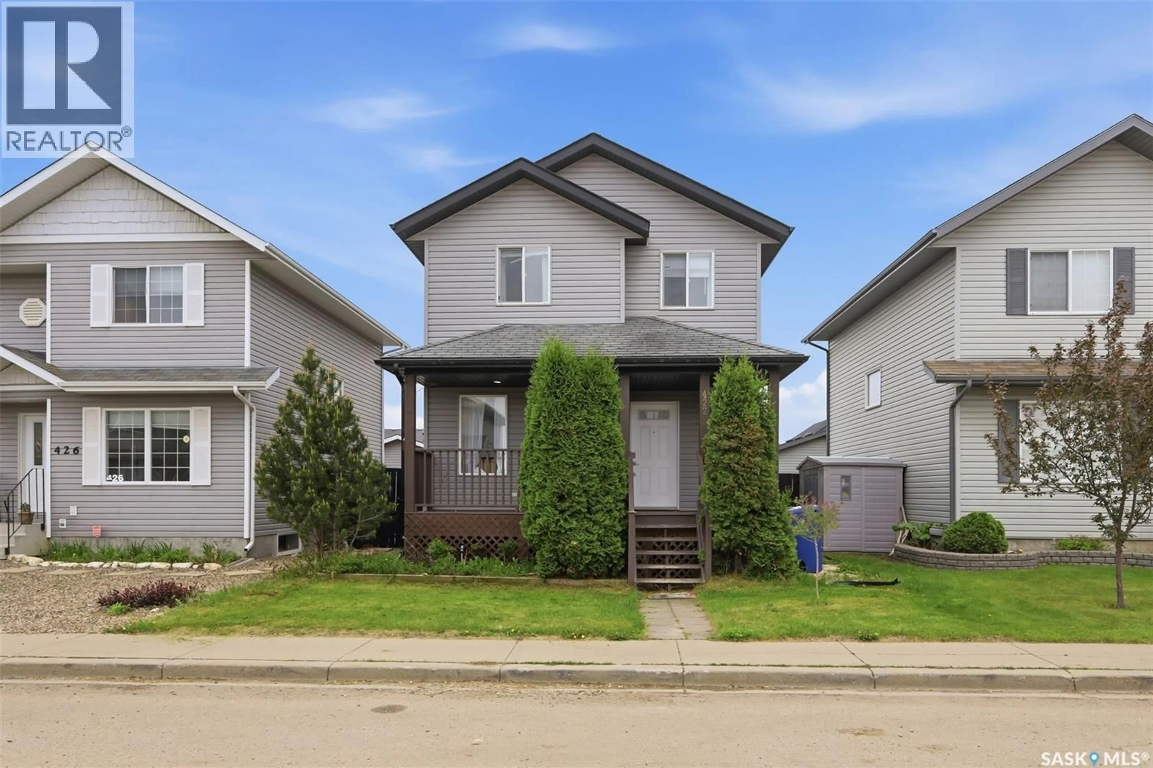 Home with vinyl exterior material, street for 422 BLAKENEY CRESCENT, Saskatoon Saskatchewan S7L7N5