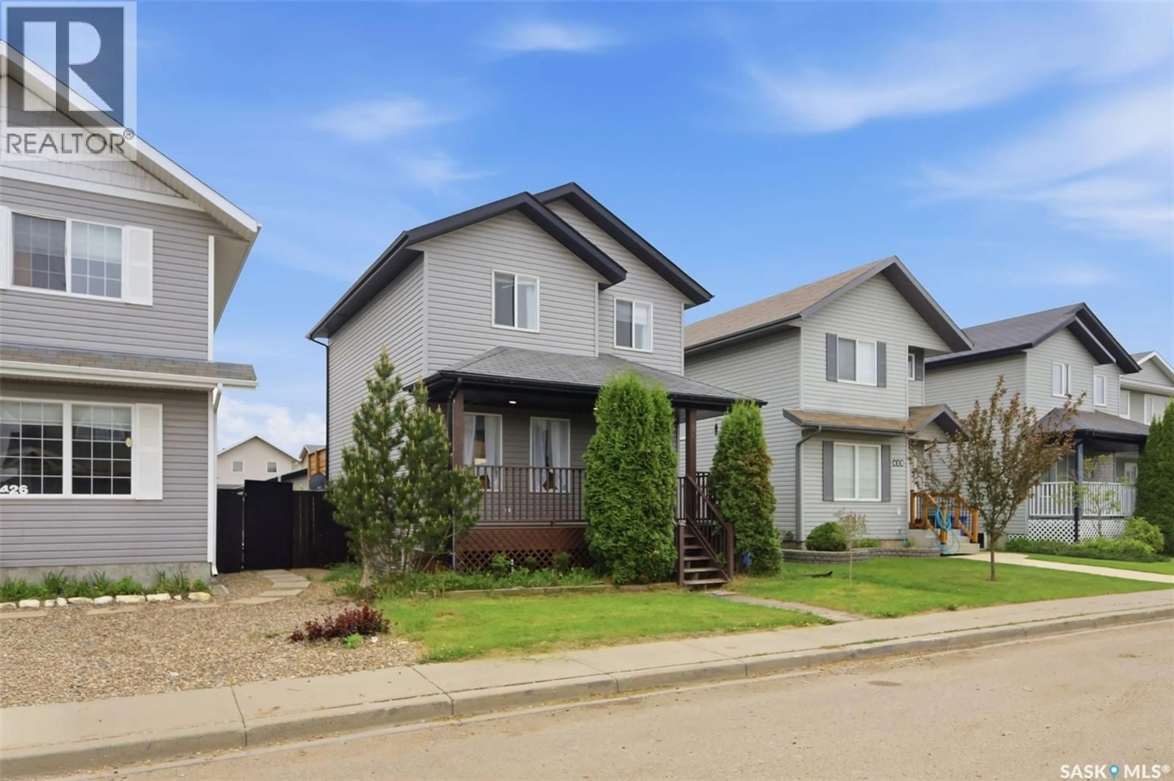 Home with vinyl exterior material, street for 422 BLAKENEY CRESCENT, Saskatoon Saskatchewan S7L7N5
