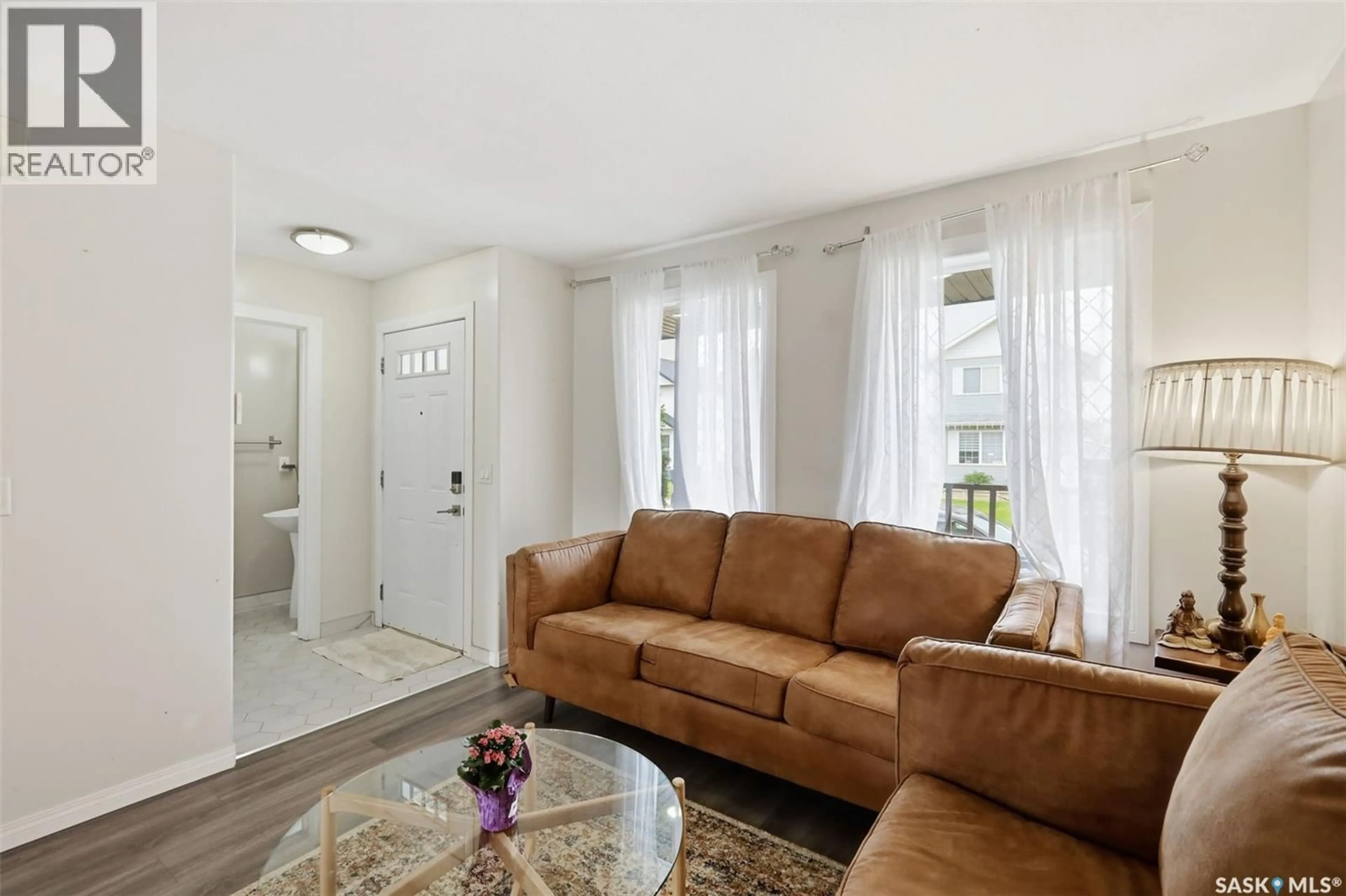 Living room with furniture, unknown for 422 BLAKENEY CRESCENT, Saskatoon Saskatchewan S7L7N5
