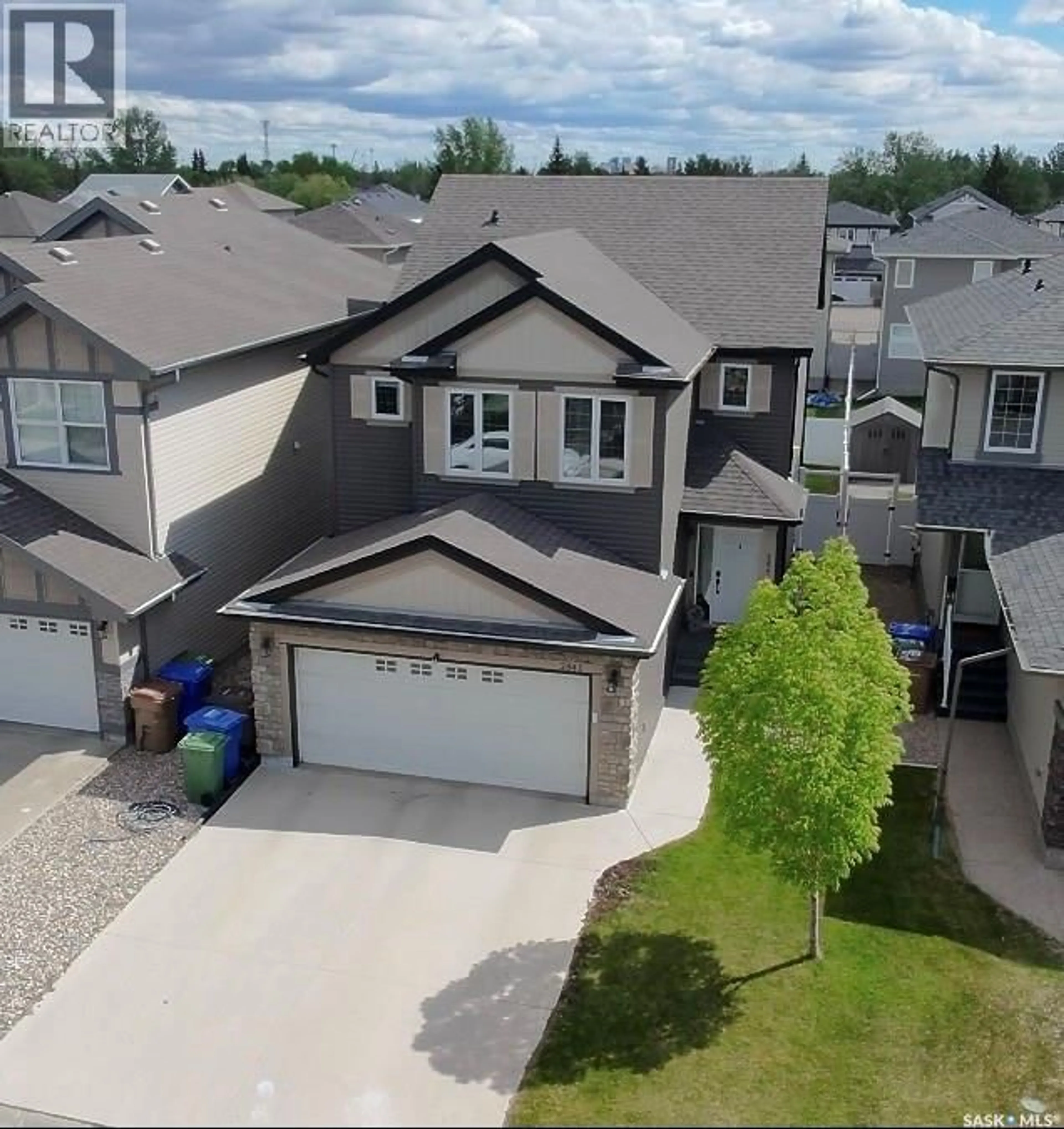 A pic from outside/outdoor area/front of a property/back of a property/a pic from drone, street for 2841 ELGAARD DRIVE, Regina Saskatchewan S4X0M4