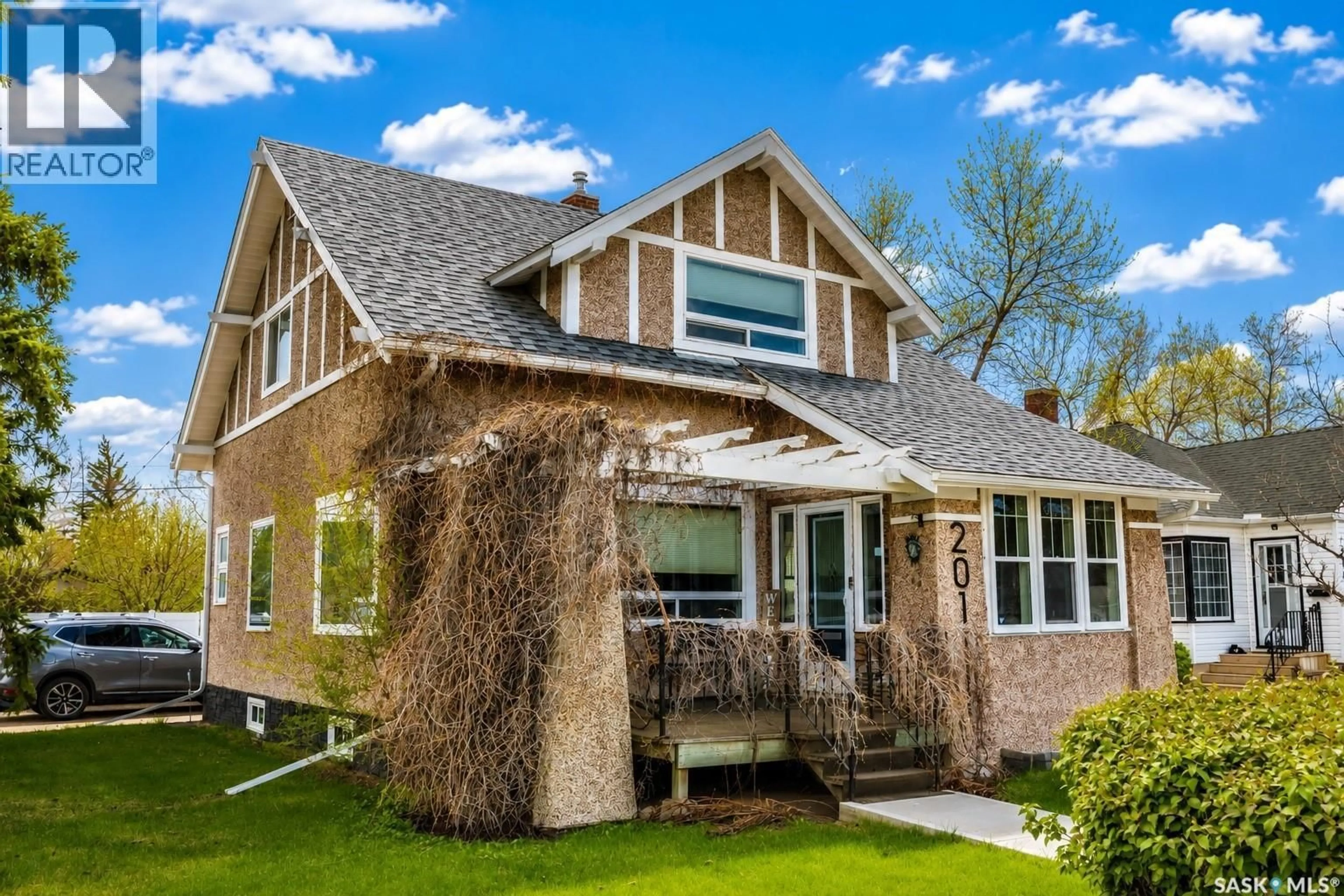 Home with brick exterior material, street for 201 ATHABASCA STREET, Moose Jaw Saskatchewan S6H2B8