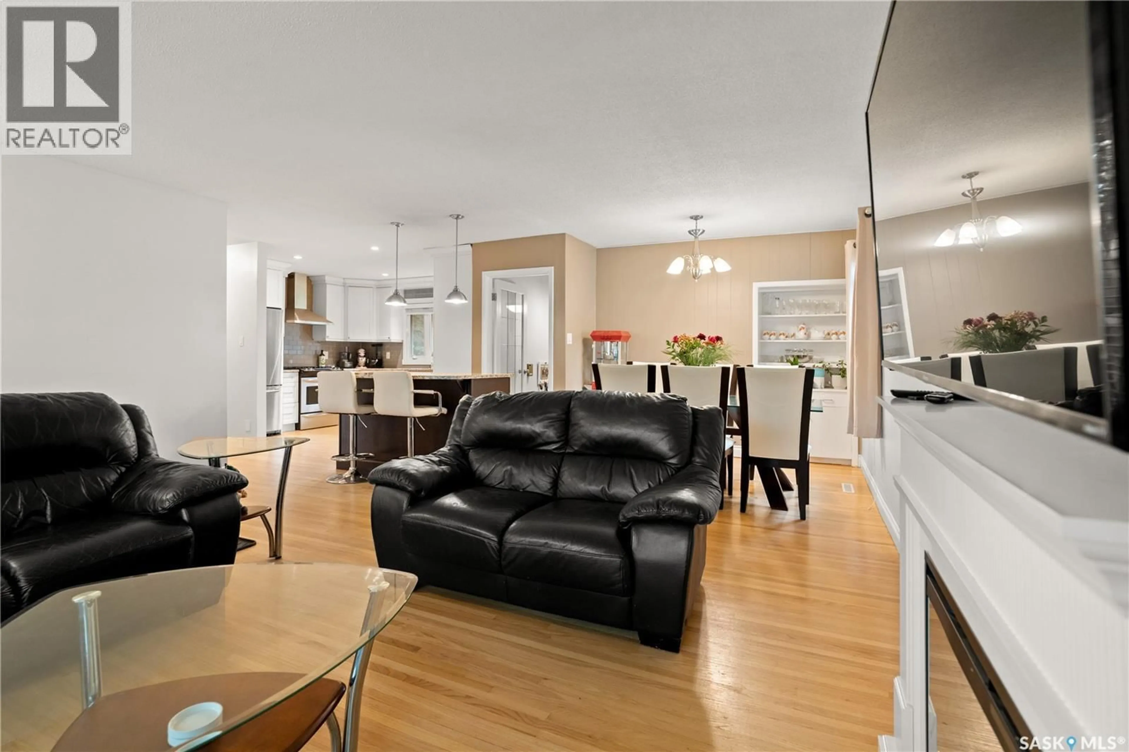 Open concept kitchen, wood/laminate floor for 17 ANDERSON AVENUE, Regina Saskatchewan S4S4R3