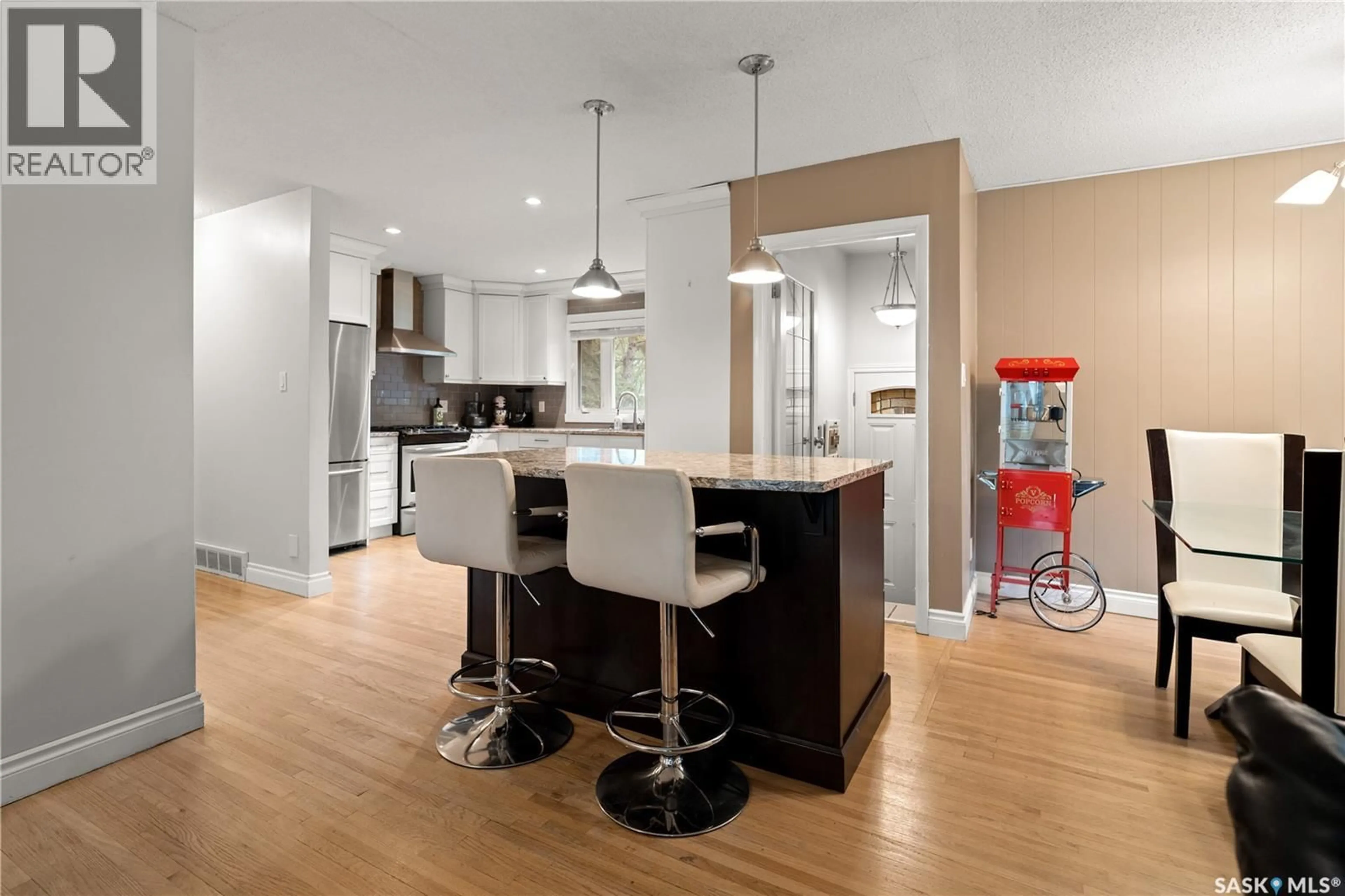 Open concept kitchen, wood/laminate floor for 17 ANDERSON AVENUE, Regina Saskatchewan S4S4R3