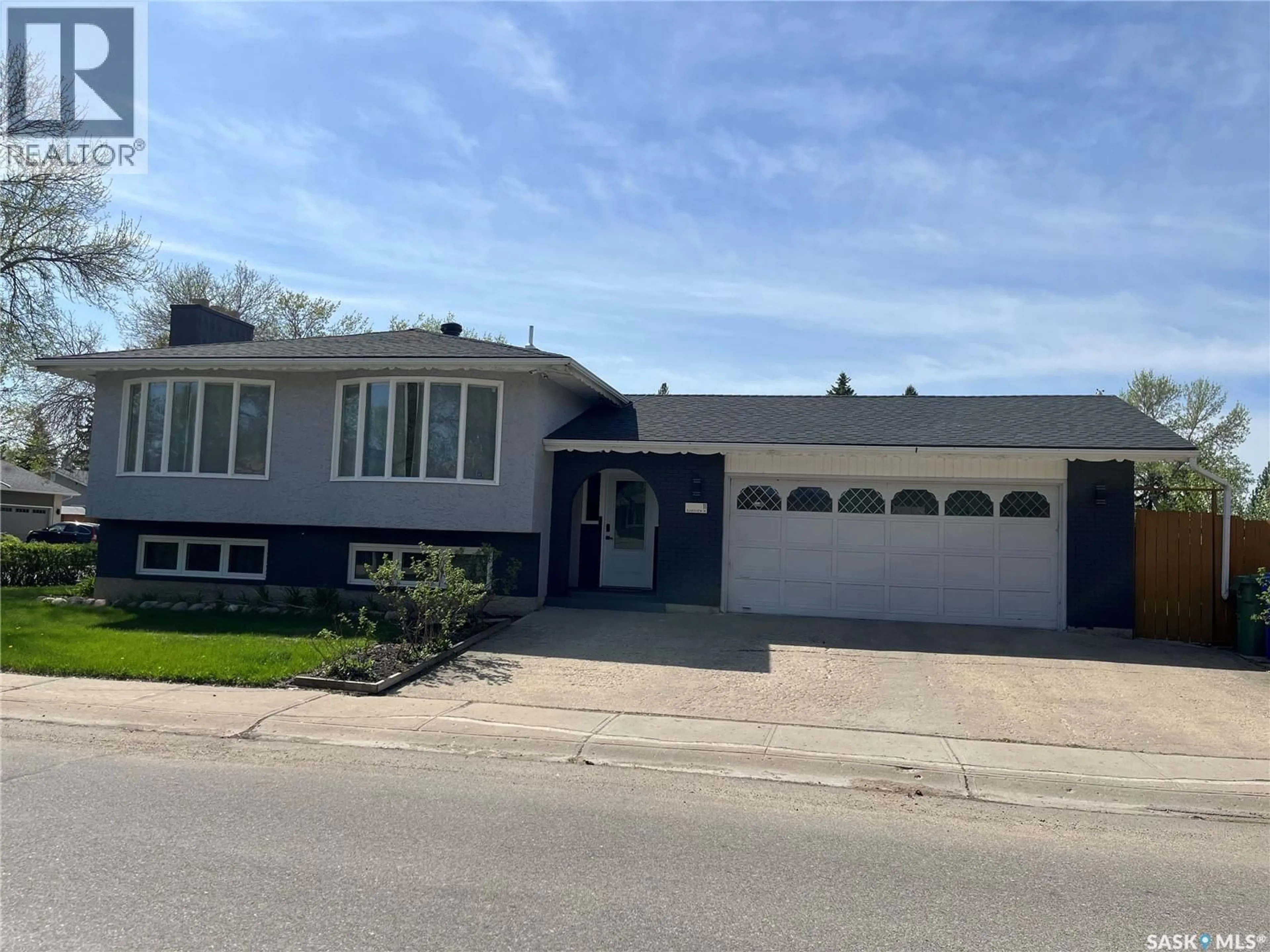 Home with vinyl exterior material, street for 11 PLAINSVIEW DRIVE, Regina Saskatchewan S4S6J2