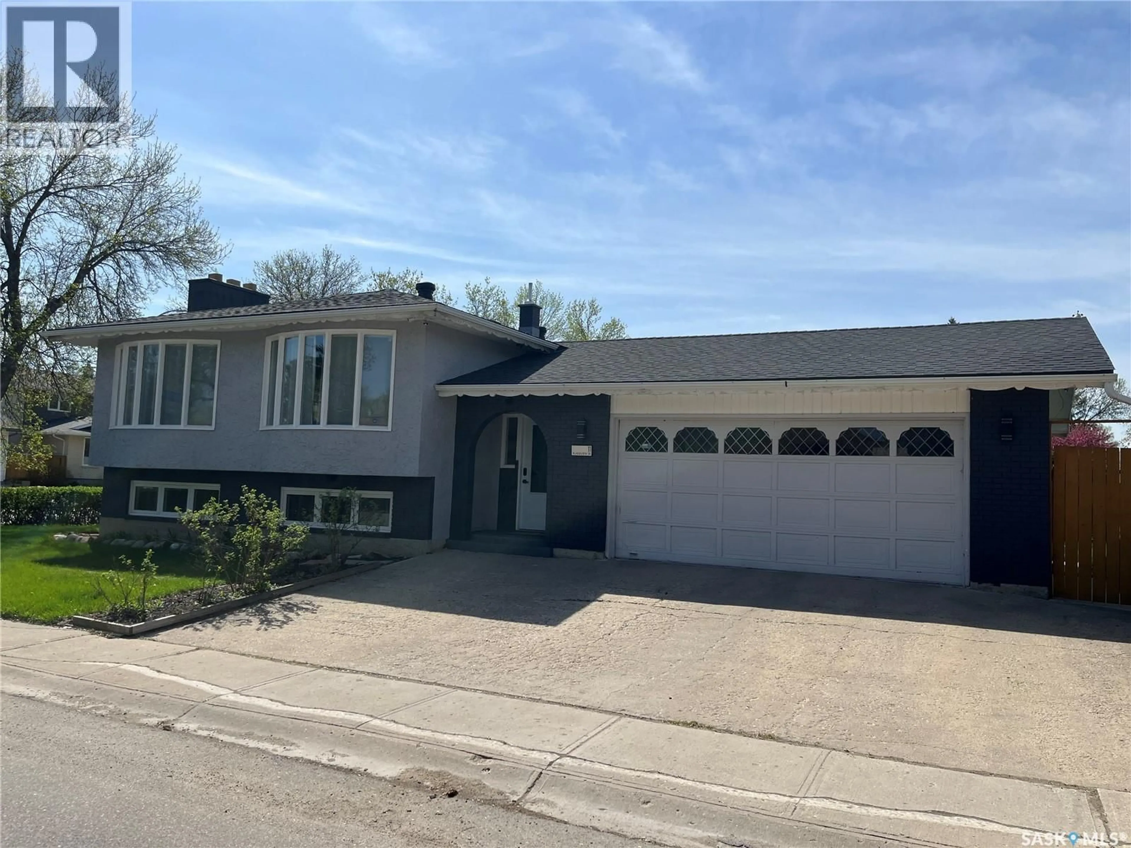 Home with vinyl exterior material, street for 11 PLAINSVIEW DRIVE, Regina Saskatchewan S4S6J2