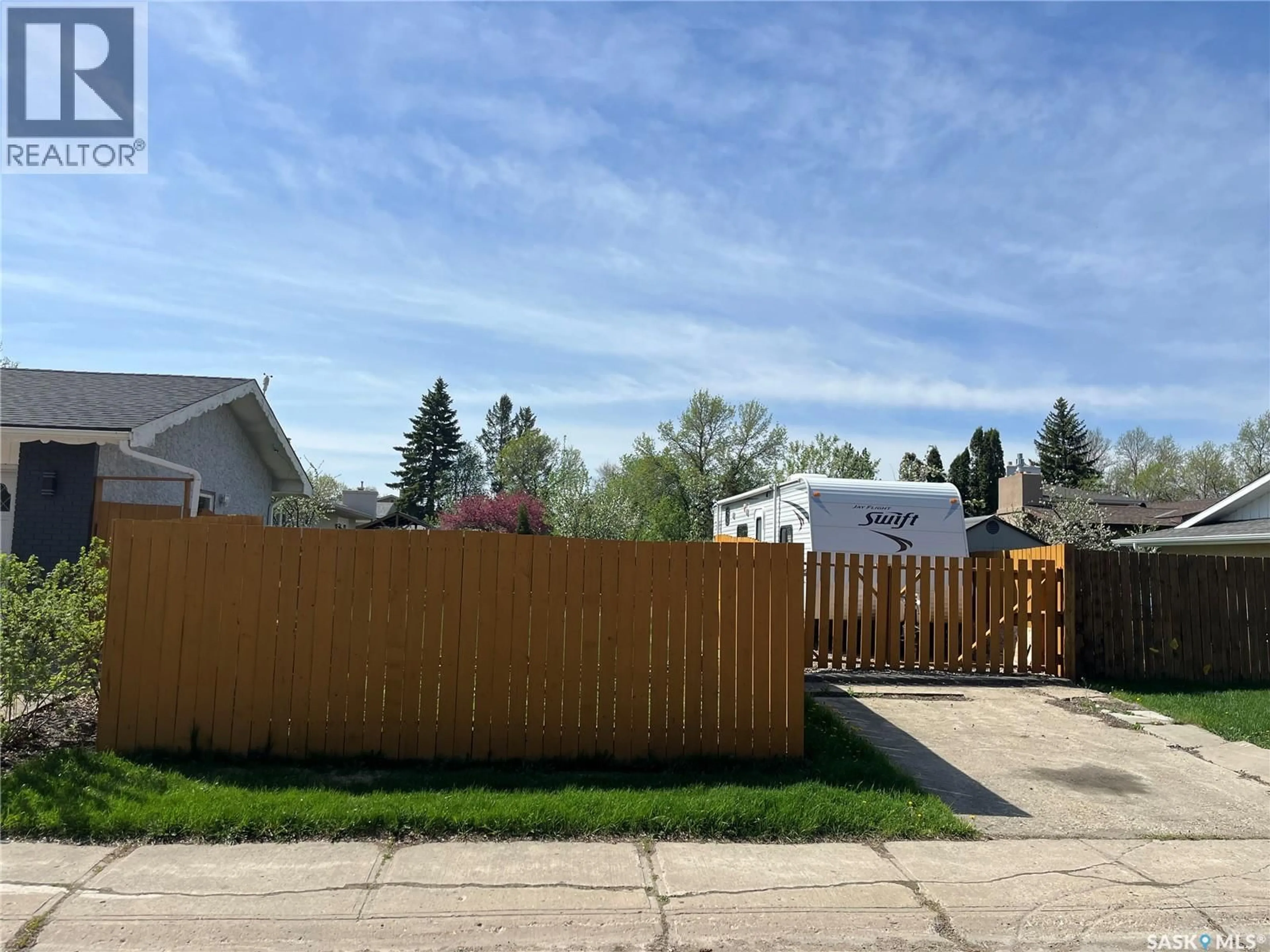A pic from outside/outdoor area/front of a property/back of a property/a pic from drone, street for 11 PLAINSVIEW DRIVE, Regina Saskatchewan S4S6J2