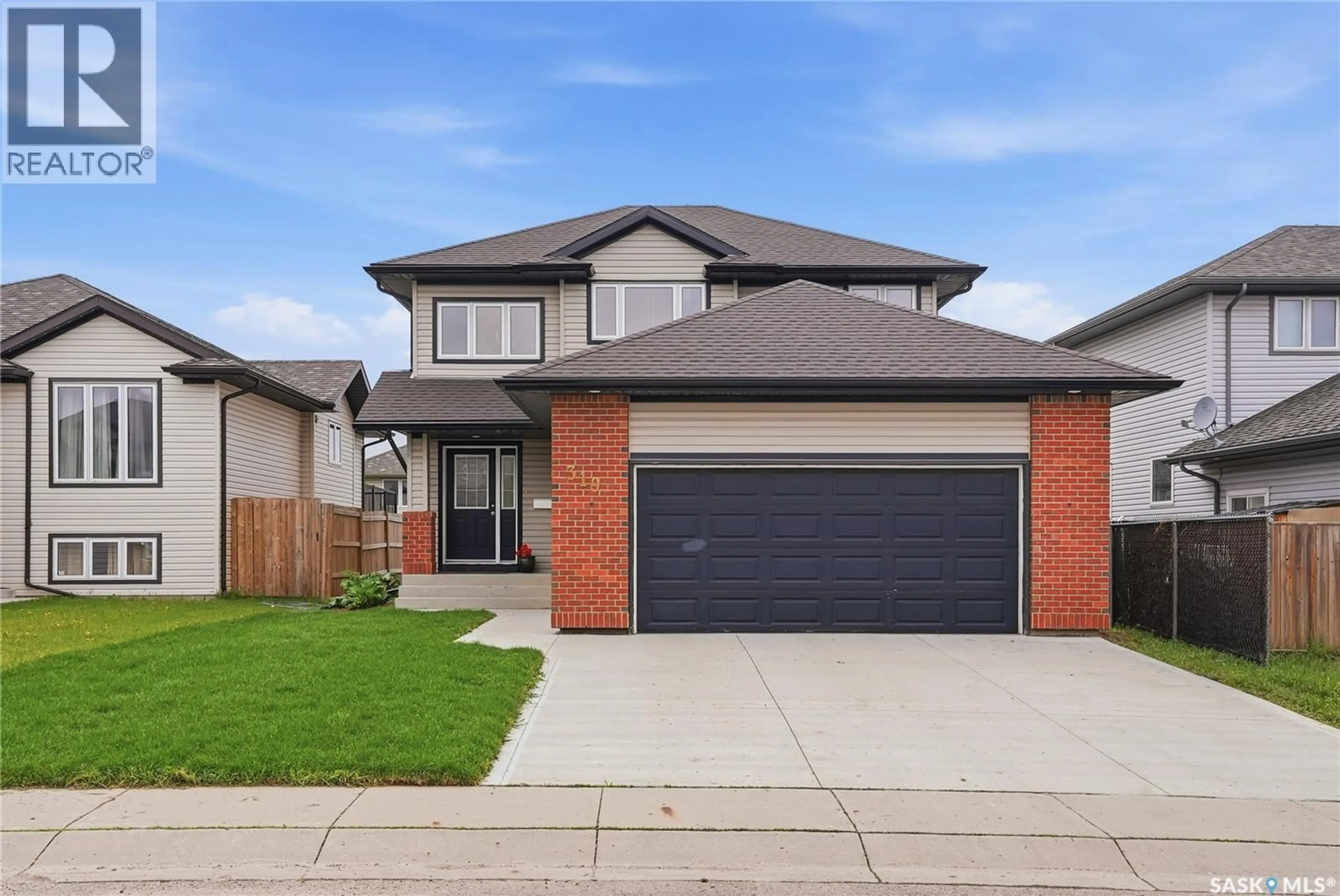 Home with brick exterior material, street for 319 ALLWOOD CRESCENT, Saskatoon Saskatchewan S7R0A4