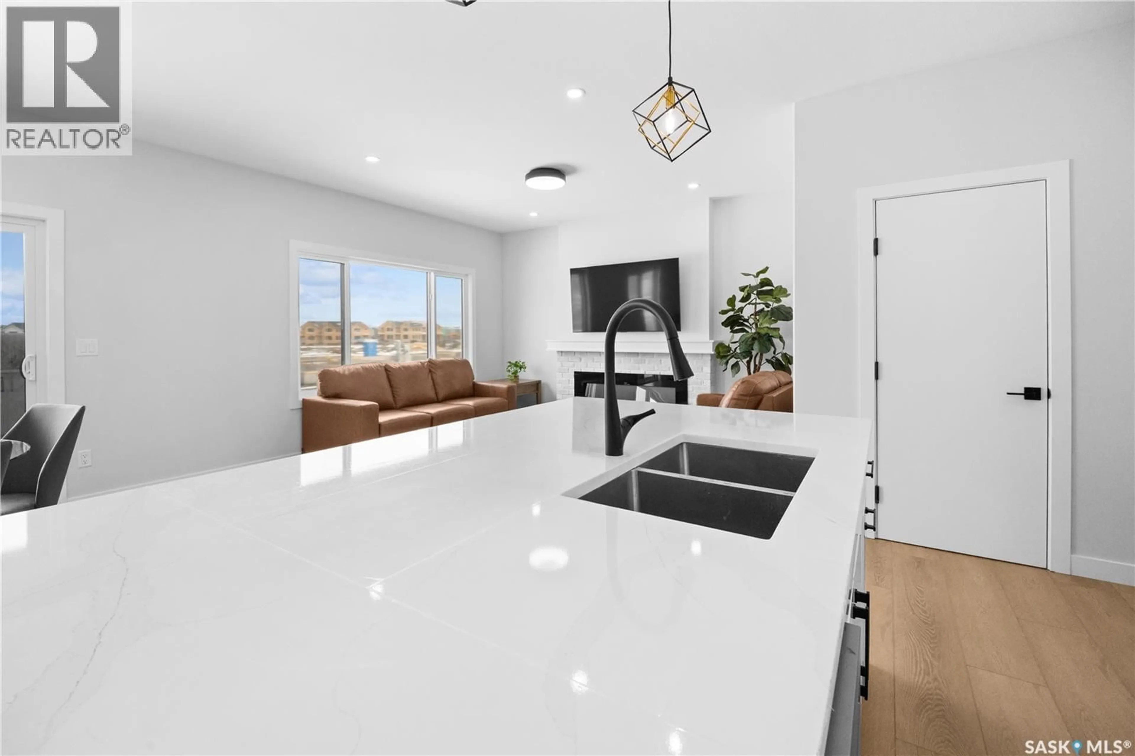 Open concept kitchen, ceramic/tile floor for 243 LESKIW LANE, Saskatoon Saskatchewan S7V2A6