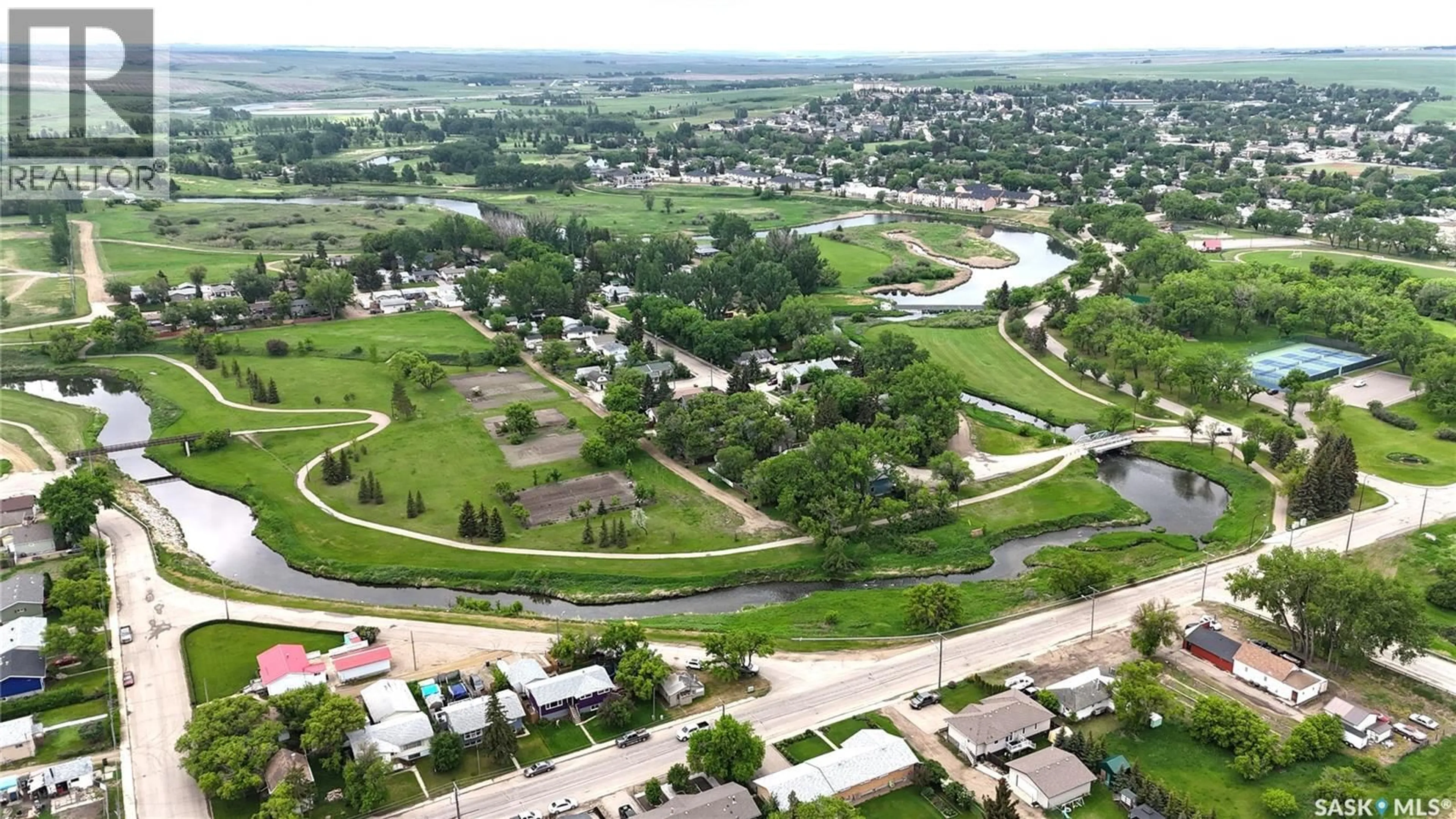 A pic from outside/outdoor area/front of a property/back of a property/a pic from drone, street for 24 13TH AVENUE, Swift Current Saskatchewan S9H4C3