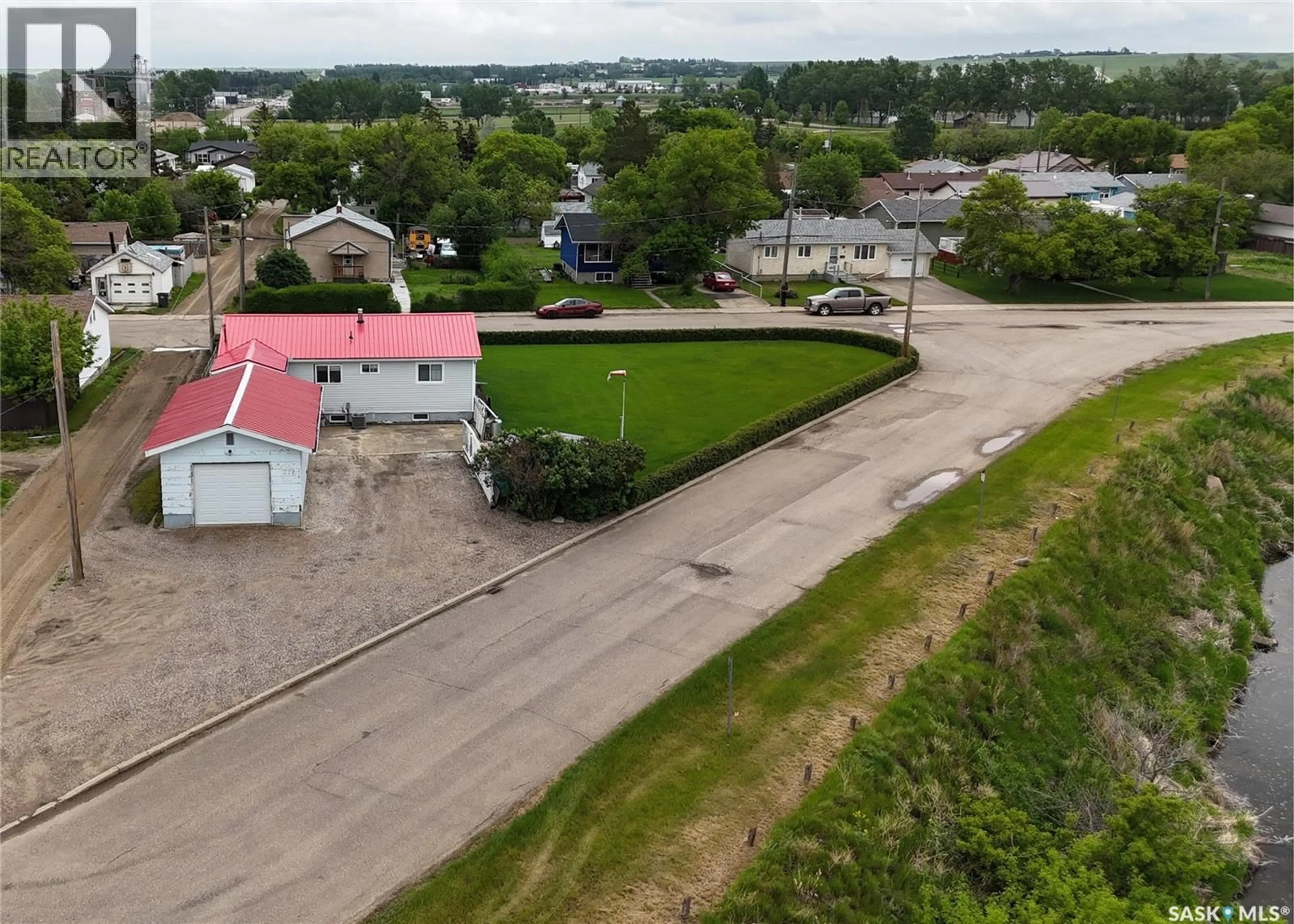 A pic from outside/outdoor area/front of a property/back of a property/a pic from drone, street for 24 13TH AVENUE, Swift Current Saskatchewan S9H4C3
