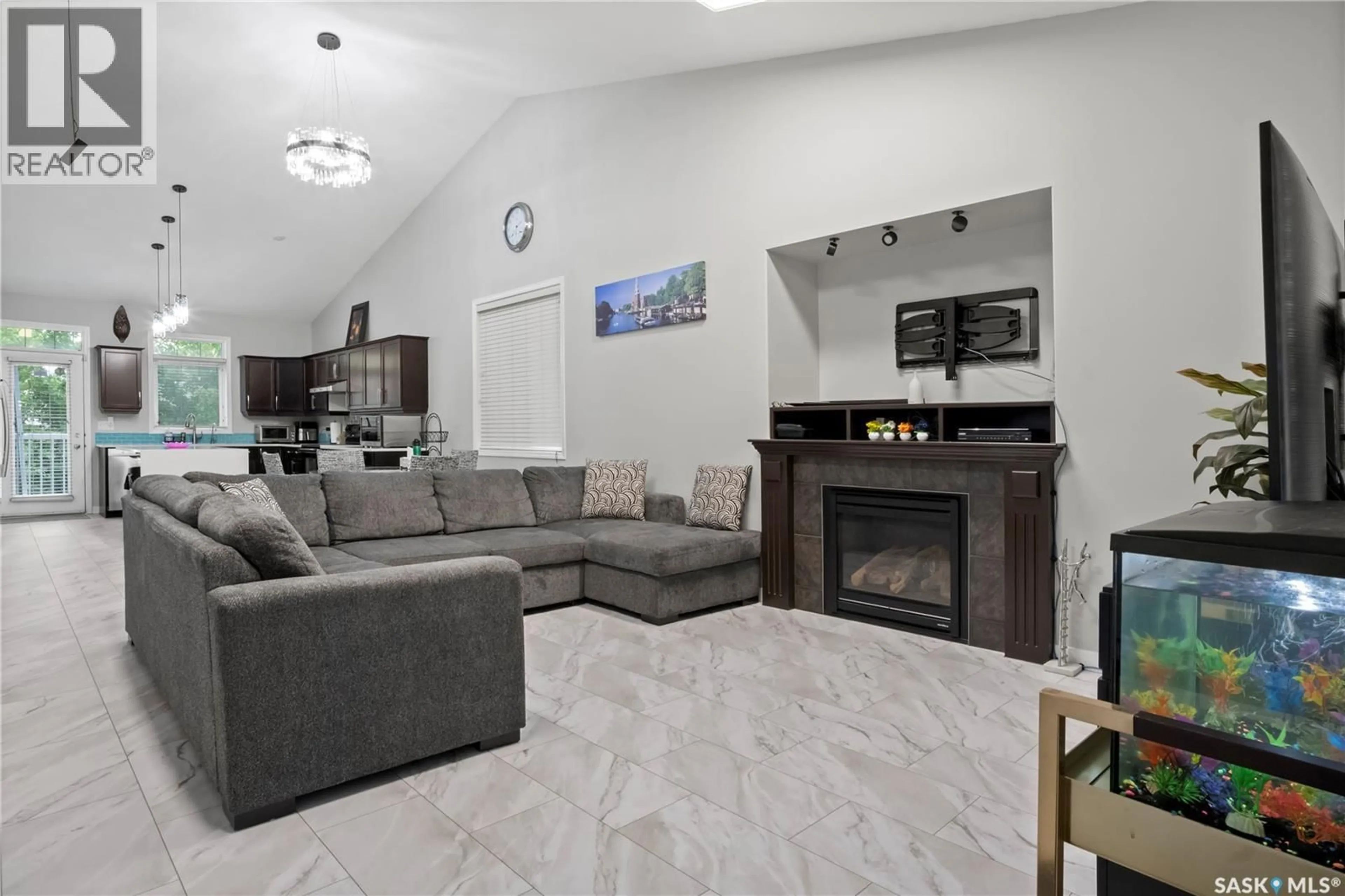 Living room with furniture, ceramic/tile floor for 4651 SHERLOCK DRIVE, Regina Saskatchewan S4X0B5