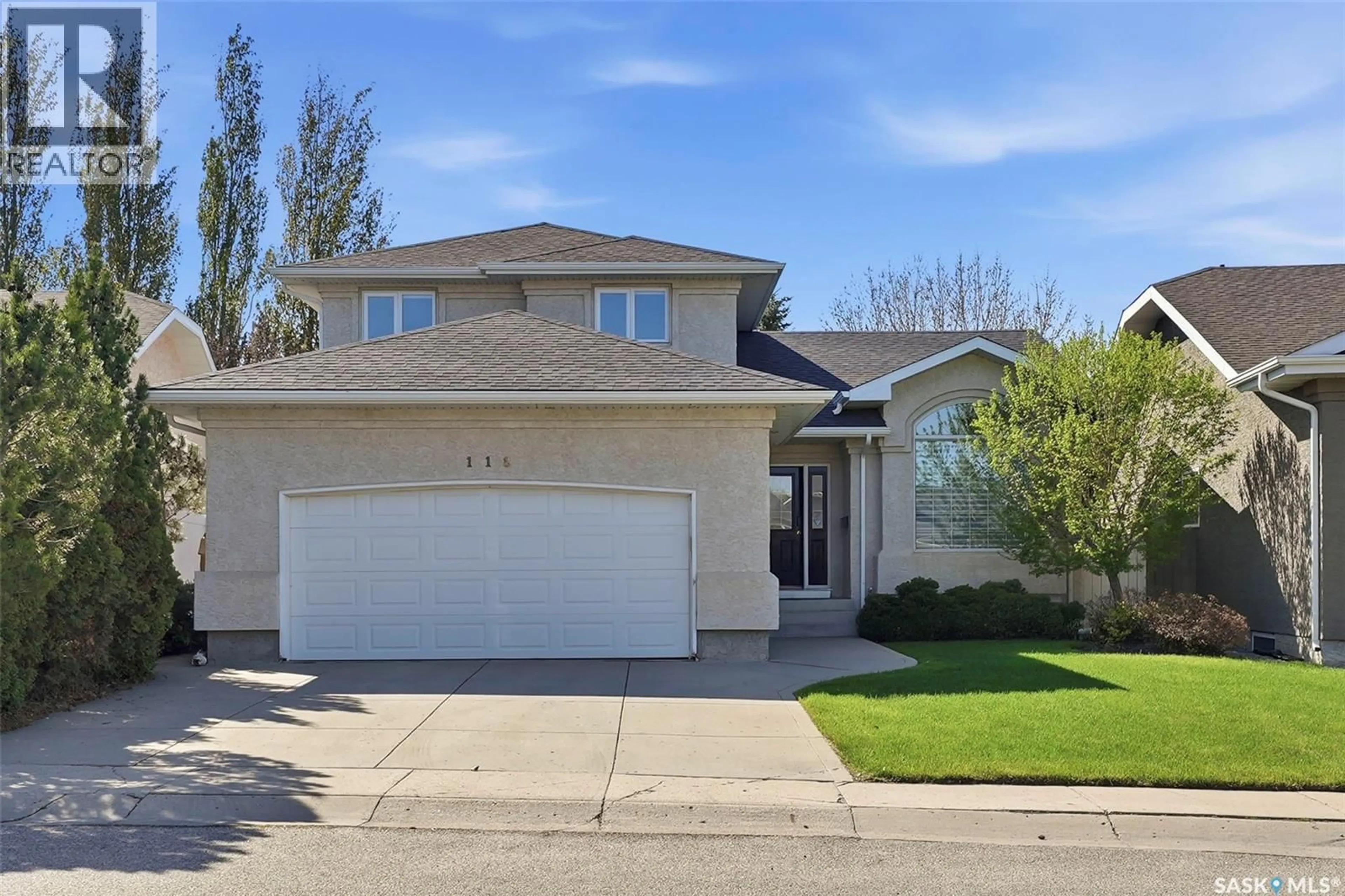 Home with vinyl exterior material, street for 118 HINITT PLACE, Saskatoon Saskatchewan S7N4M6