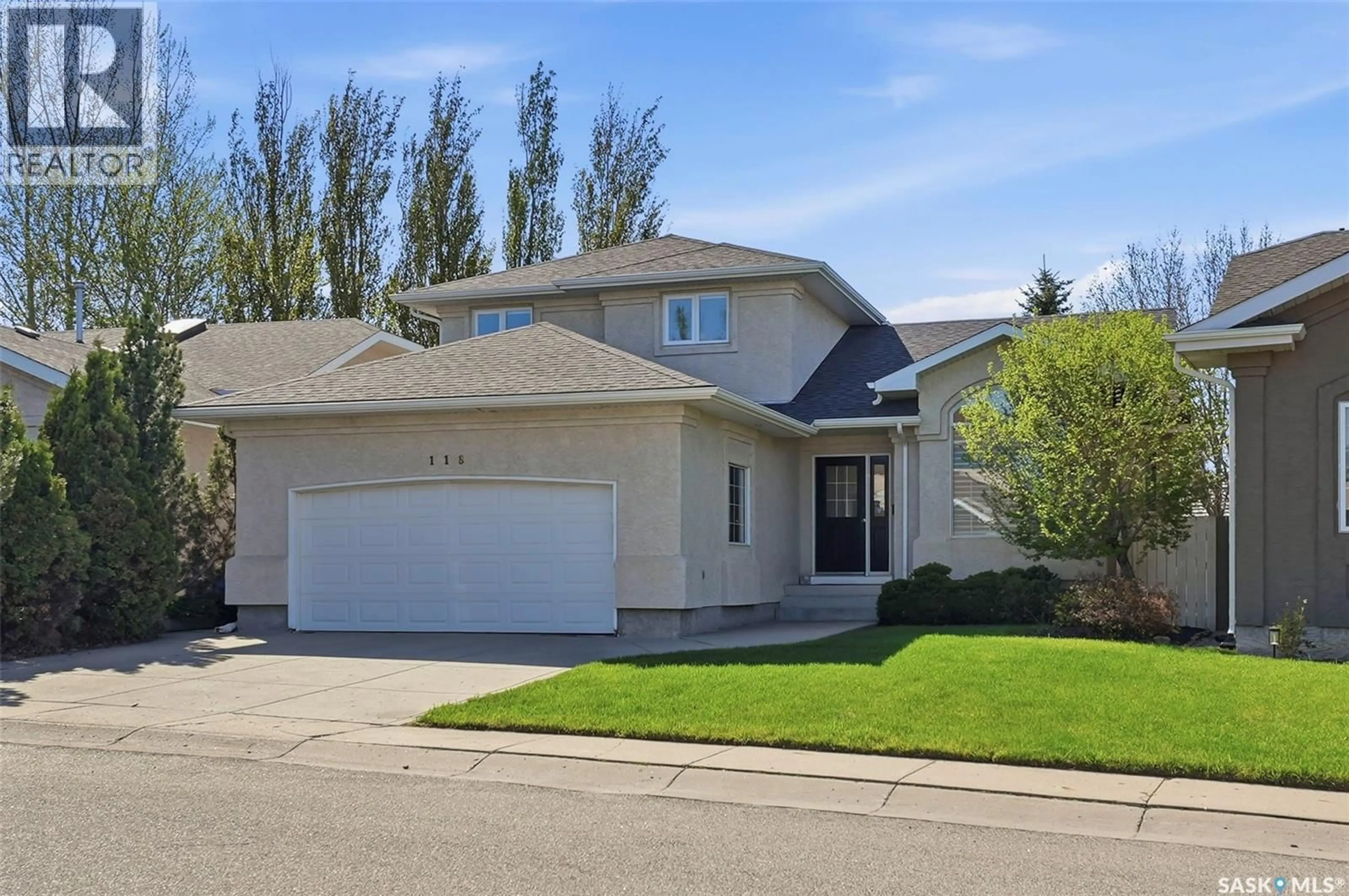 Home with vinyl exterior material, street for 118 HINITT PLACE, Saskatoon Saskatchewan S7N4M6