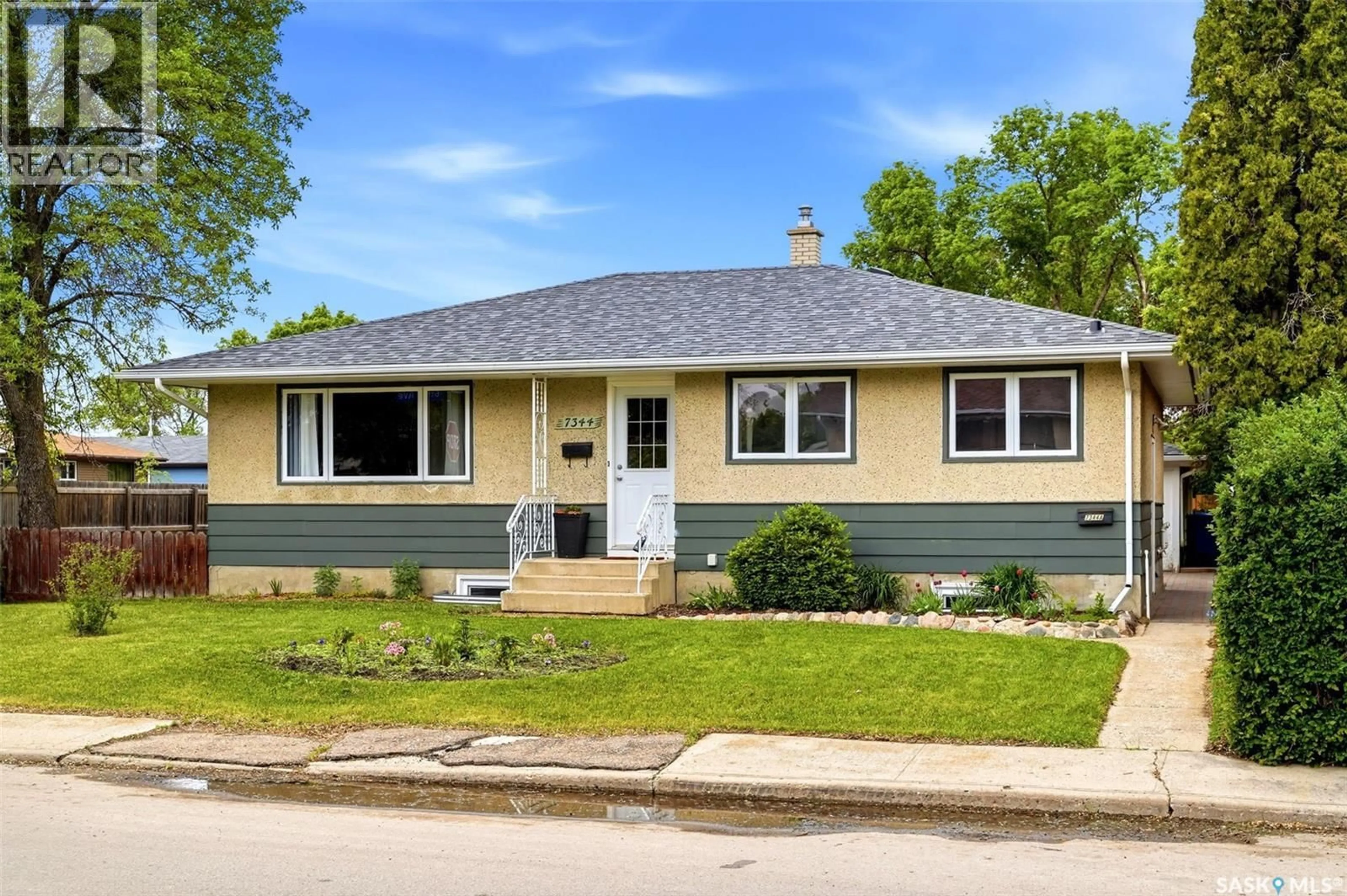 Home with vinyl exterior material, street for 7344 6TH AVENUE, Regina Saskatchewan S4T0P2