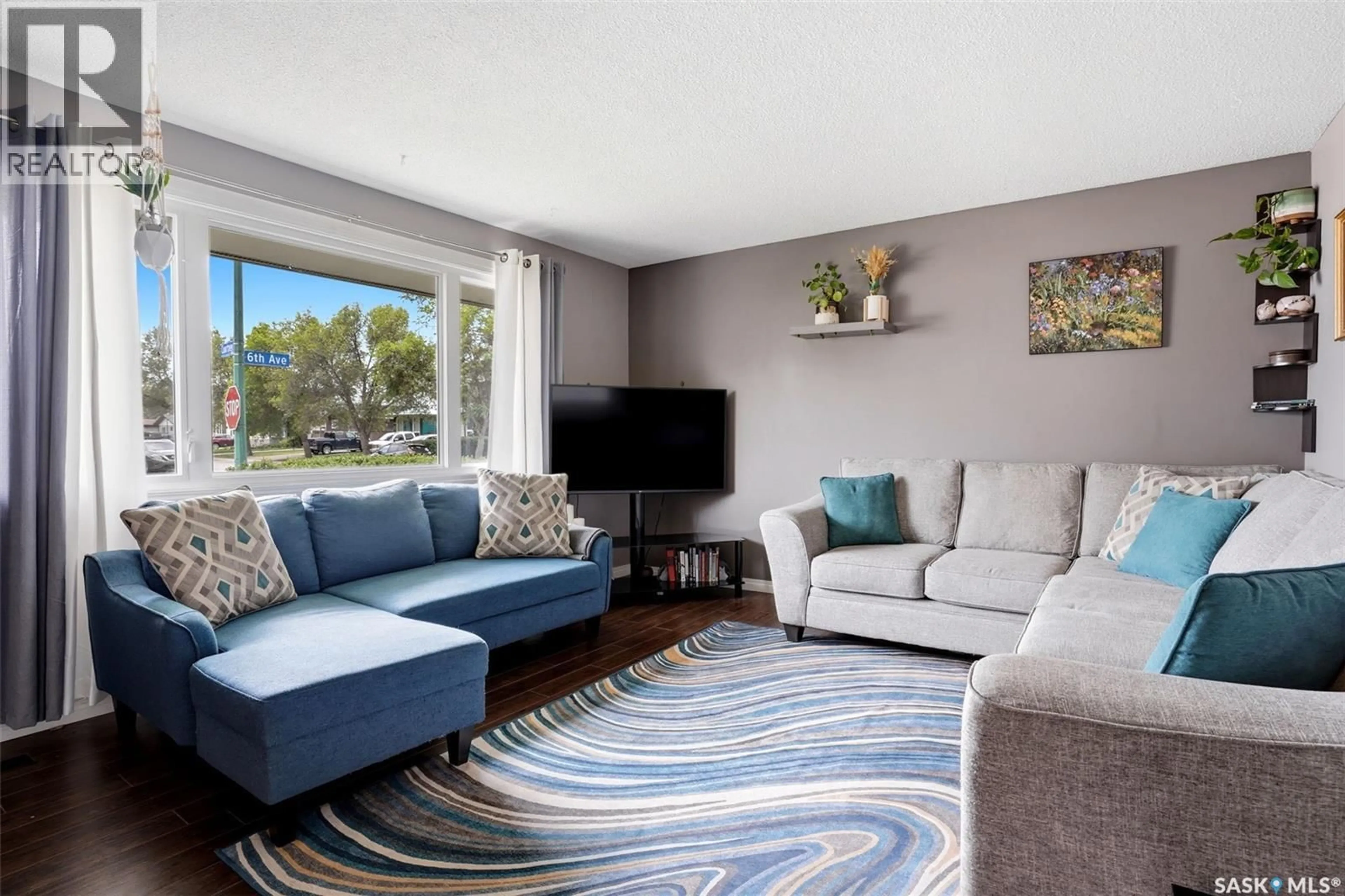 Living room with furniture, unknown for 7344 6TH AVENUE, Regina Saskatchewan S4T0P2