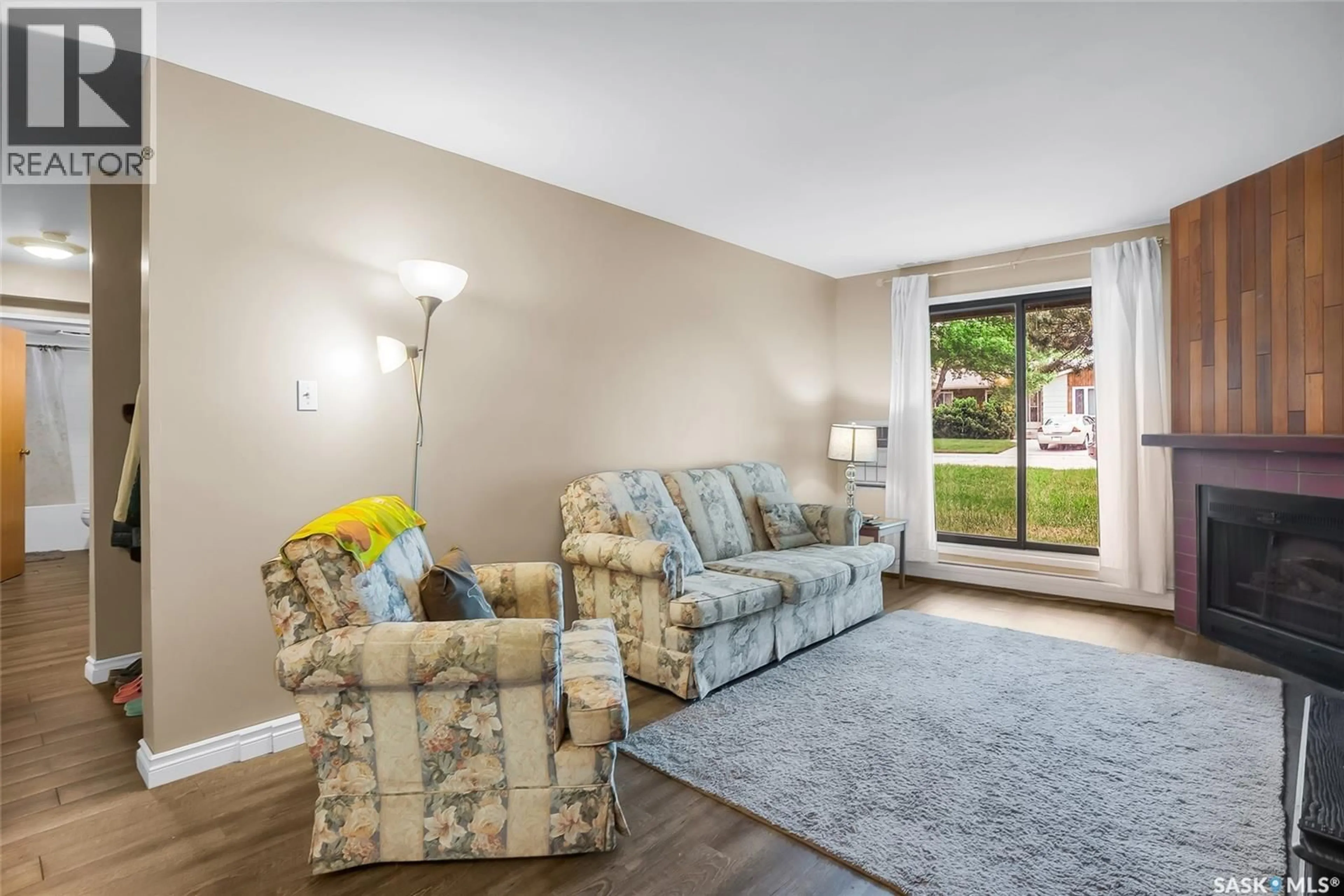 Living room with furniture, carpet floor for 310 - 612 STILLWATER DRIVE, Saskatoon Saskatchewan S7J4H7