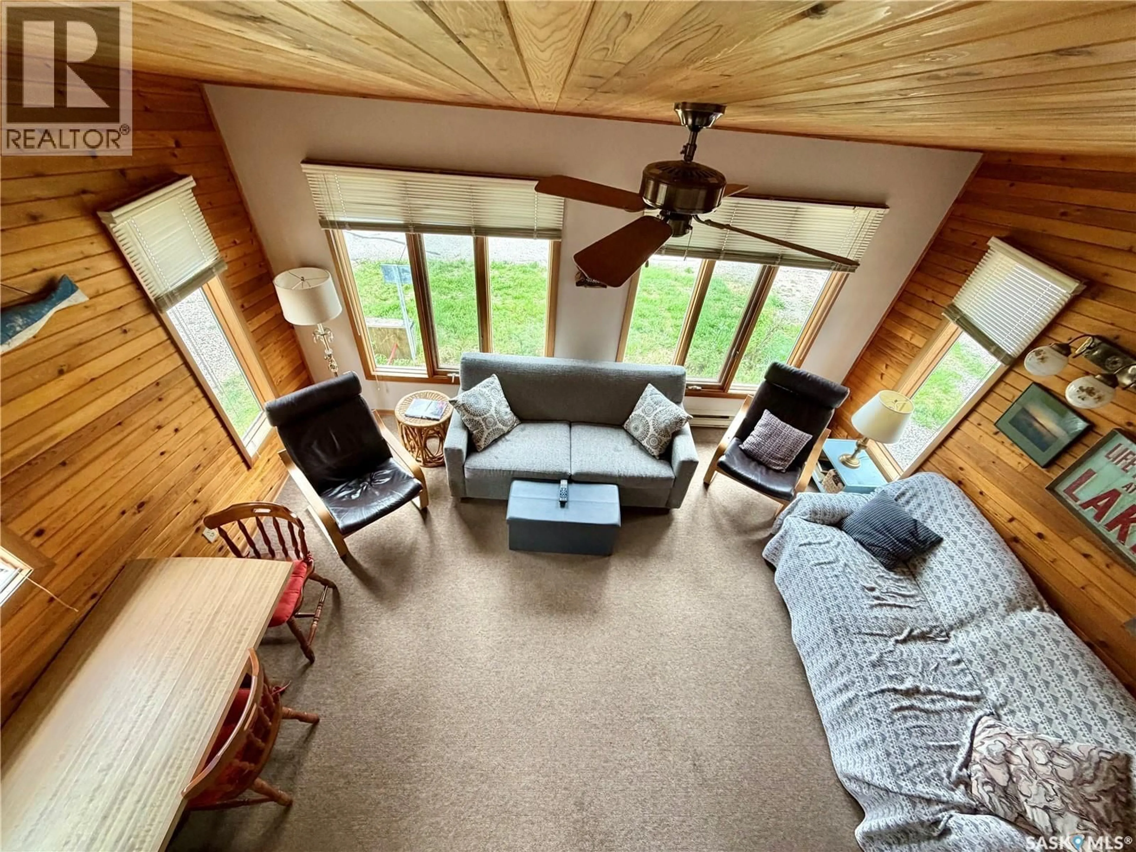 Living room with furniture, wood/laminate floor for 1515 FINCH, Prince Albert National Park Saskatchewan S0J2Y0