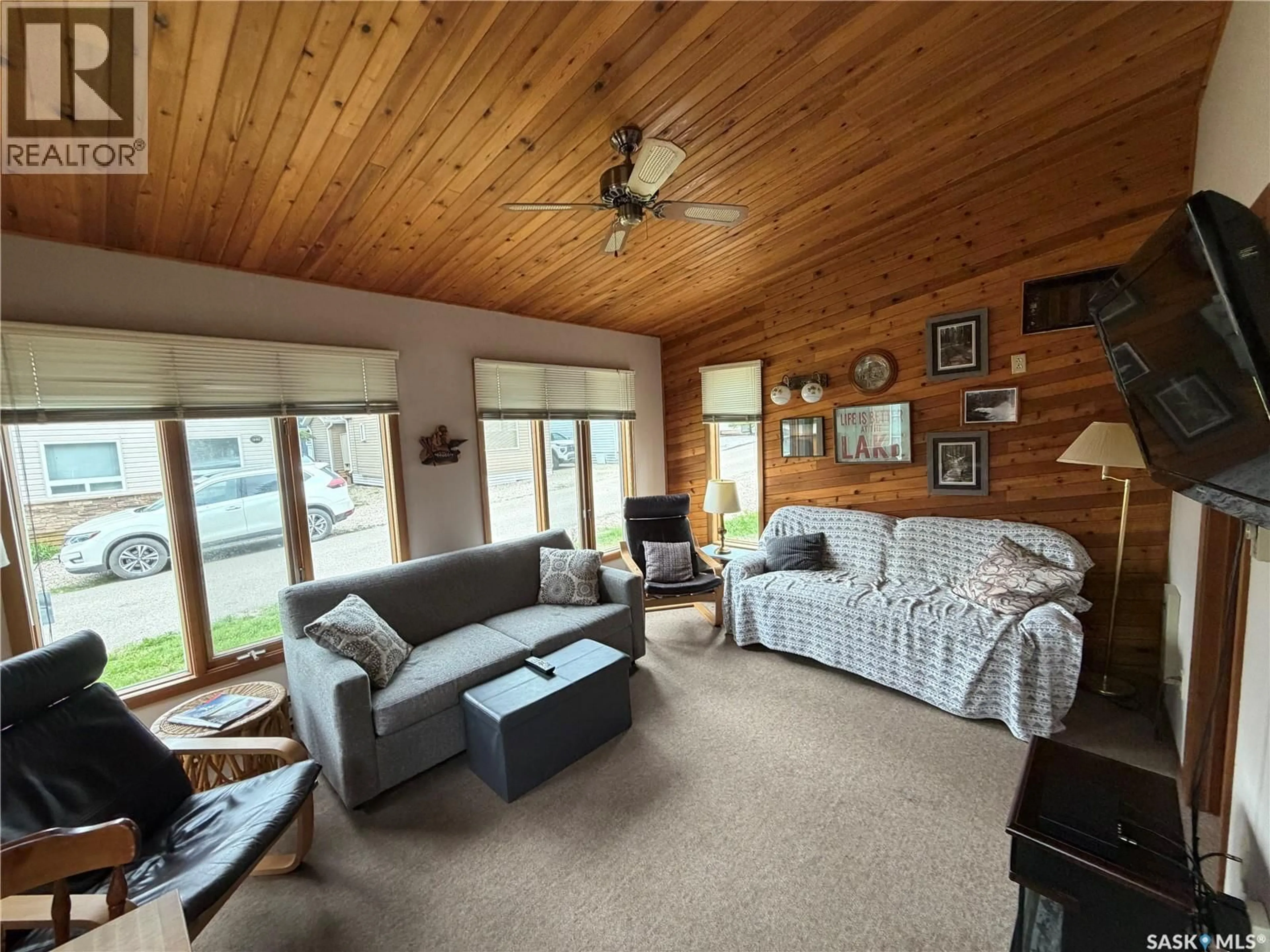 Living room with furniture, wood/laminate floor for 1515 FINCH, Prince Albert National Park Saskatchewan S0J2Y0