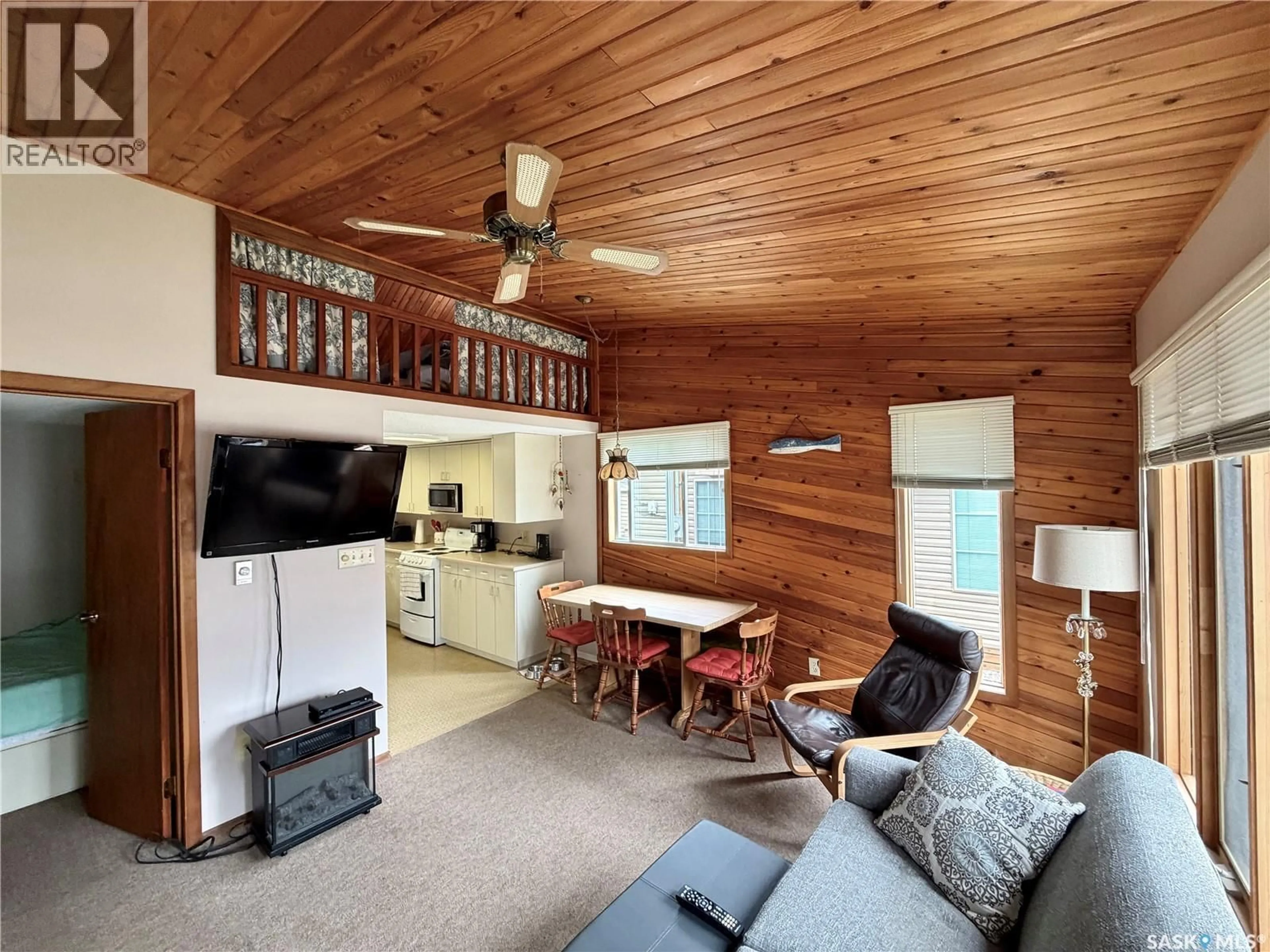 Living room with furniture, wood/laminate floor for 1515 FINCH, Prince Albert National Park Saskatchewan S0J2Y0