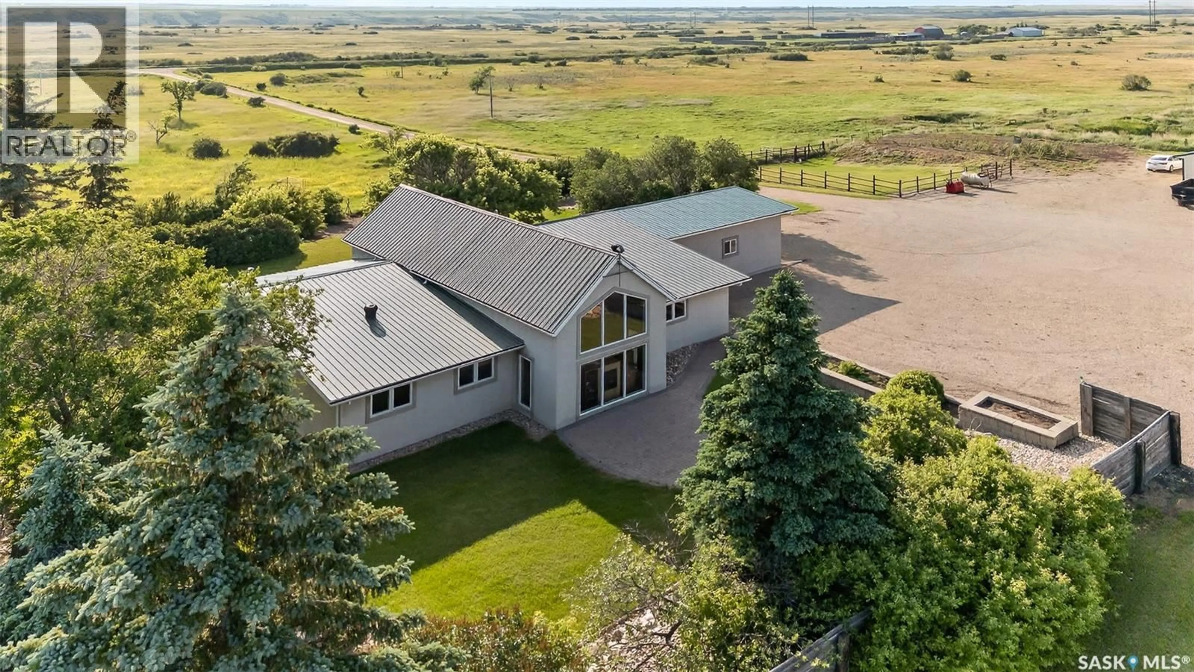 A pic from outside/outdoor area/front of a property/back of a property/a pic from drone, unknown for STONY BEACH DREAM SHOP ACREAGE, Pense Rm No. 160 Saskatchewan S0G0G0