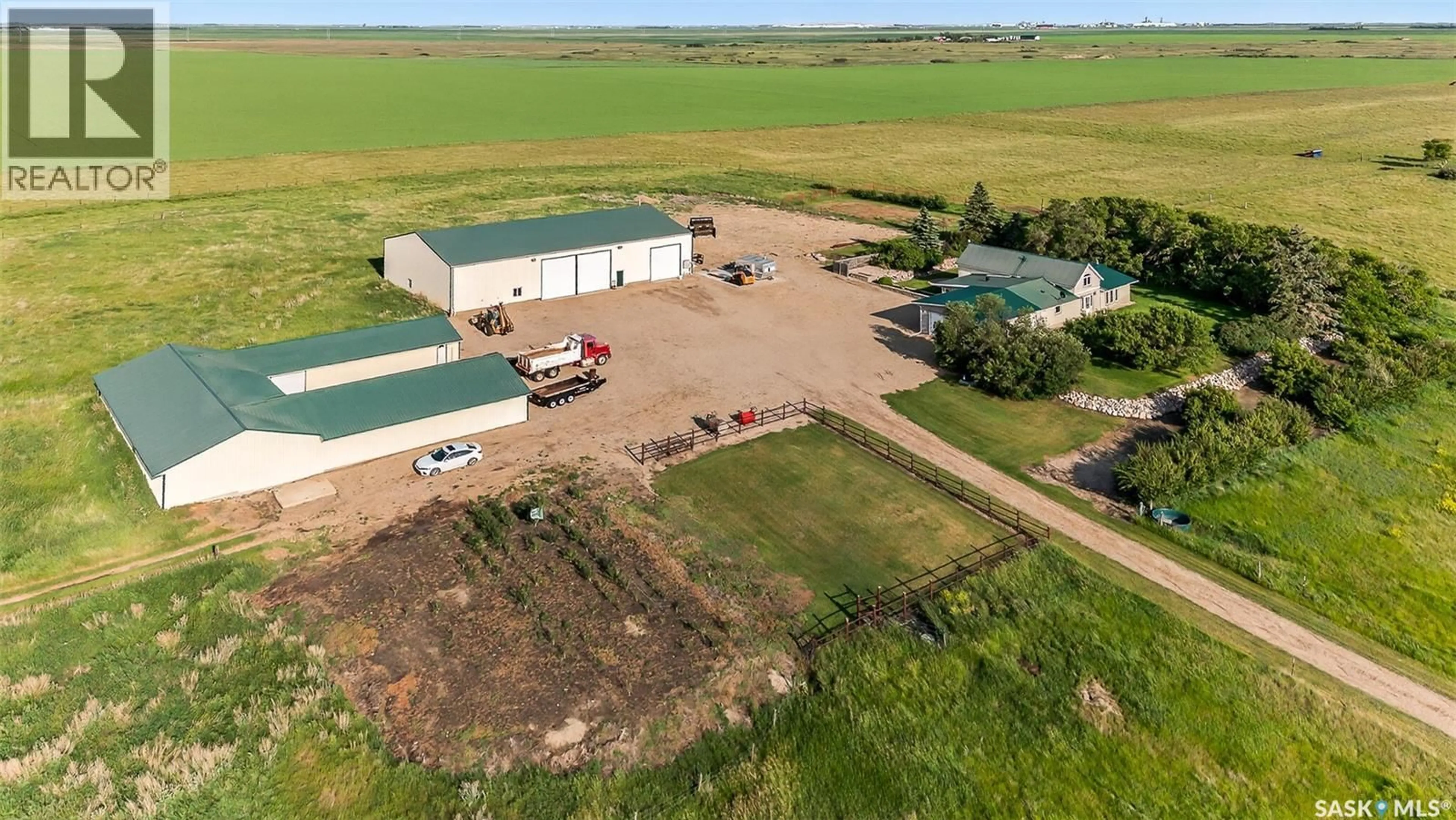 A pic from outside/outdoor area/front of a property/back of a property/a pic from drone, building for STONY BEACH DREAM SHOP ACREAGE, Pense Rm No. 160 Saskatchewan S0G0G0