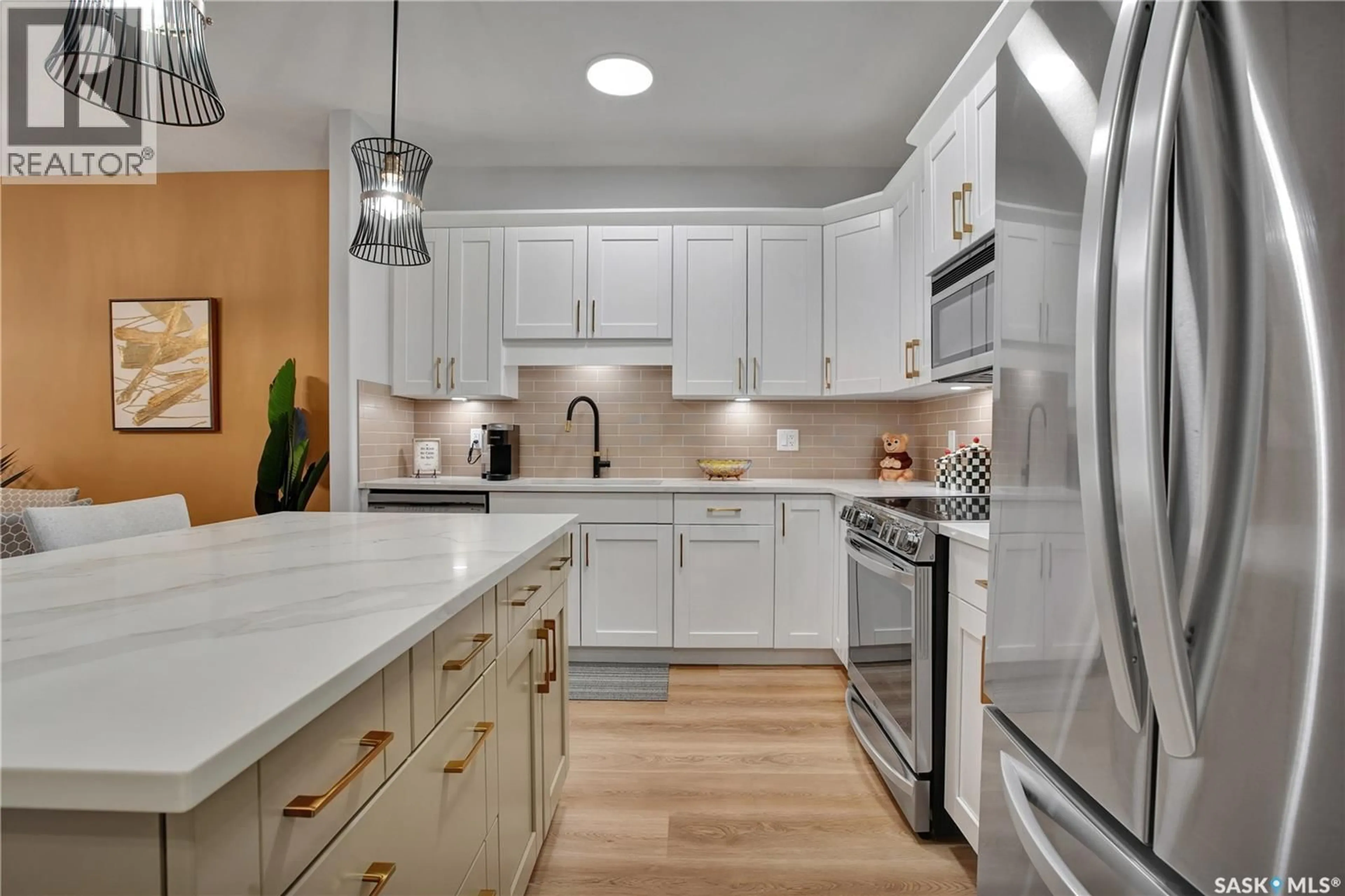 Open concept kitchen, ceramic/tile floor for 309 - 2730 MAIN STREET, Saskatoon Saskatchewan S7H0M3