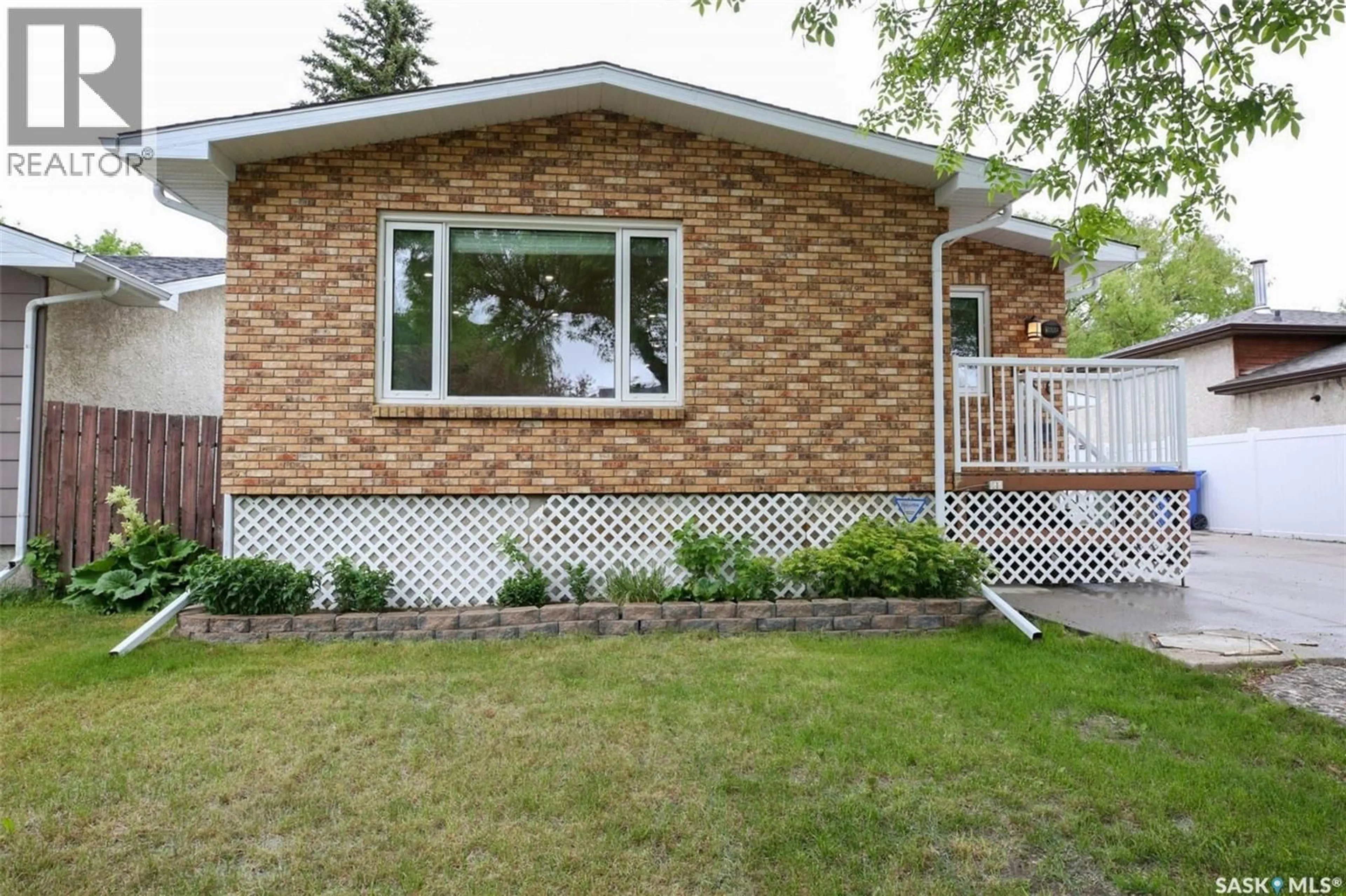 Home with brick exterior material, street for 1606 7TH AVENUE, Regina Saskatchewan S4N5S6