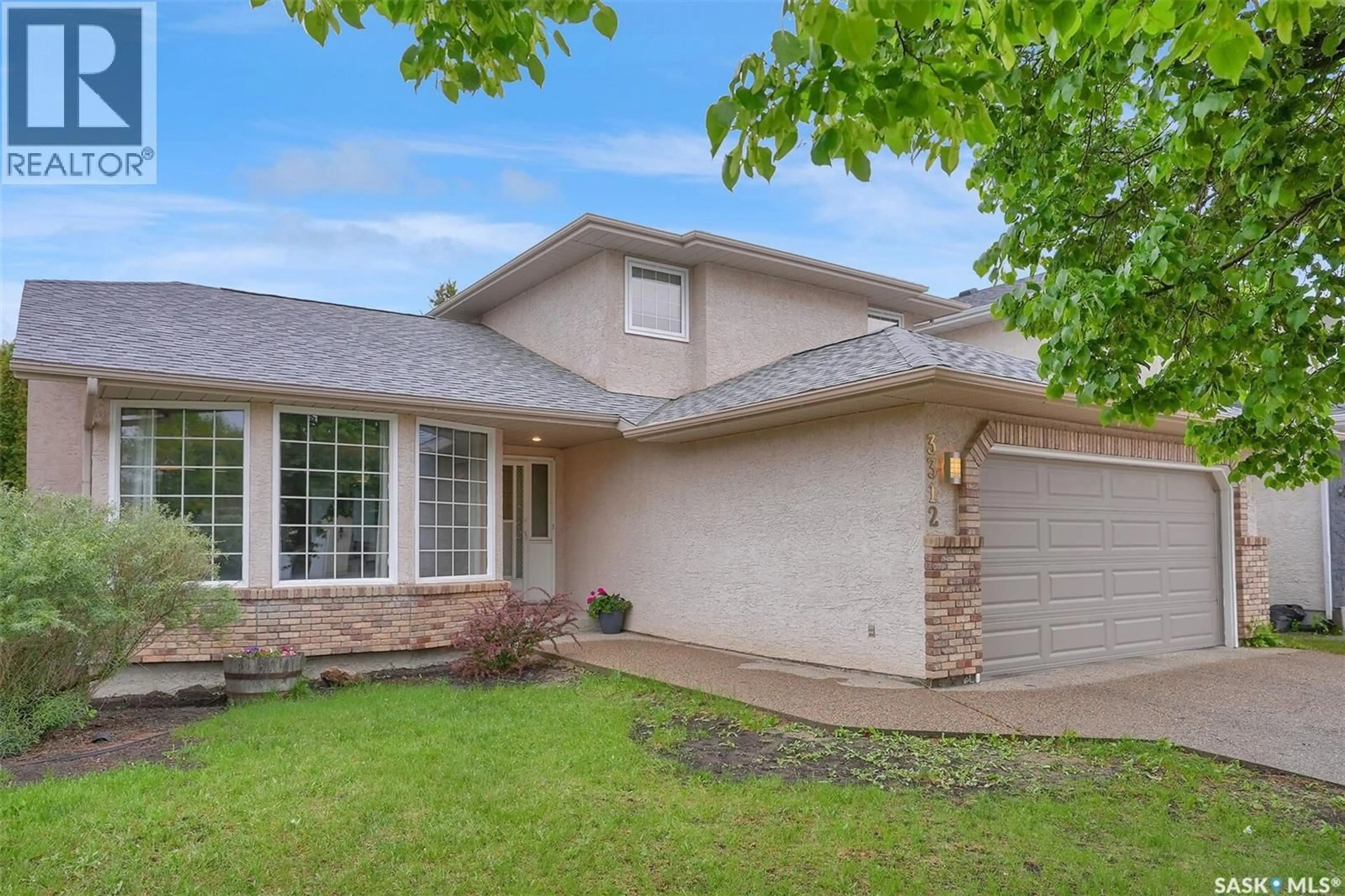 Home with brick exterior material, street for 3312 GLOUCESTER BAY, Regina Saskatchewan S4V2T9