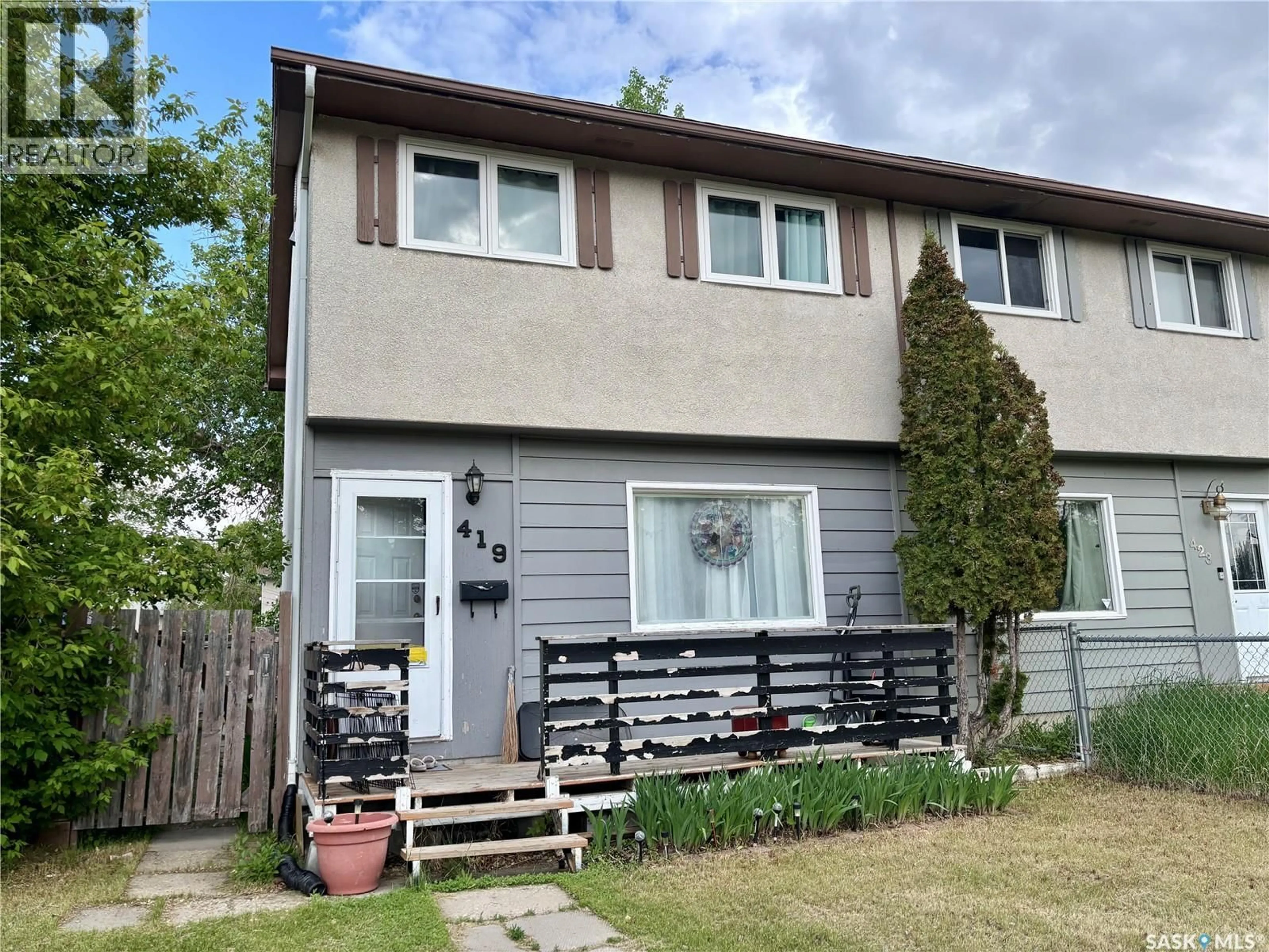 Home with vinyl exterior material, street for 419 MCINTOSH STREET, Regina Saskatchewan S4R4Z7
