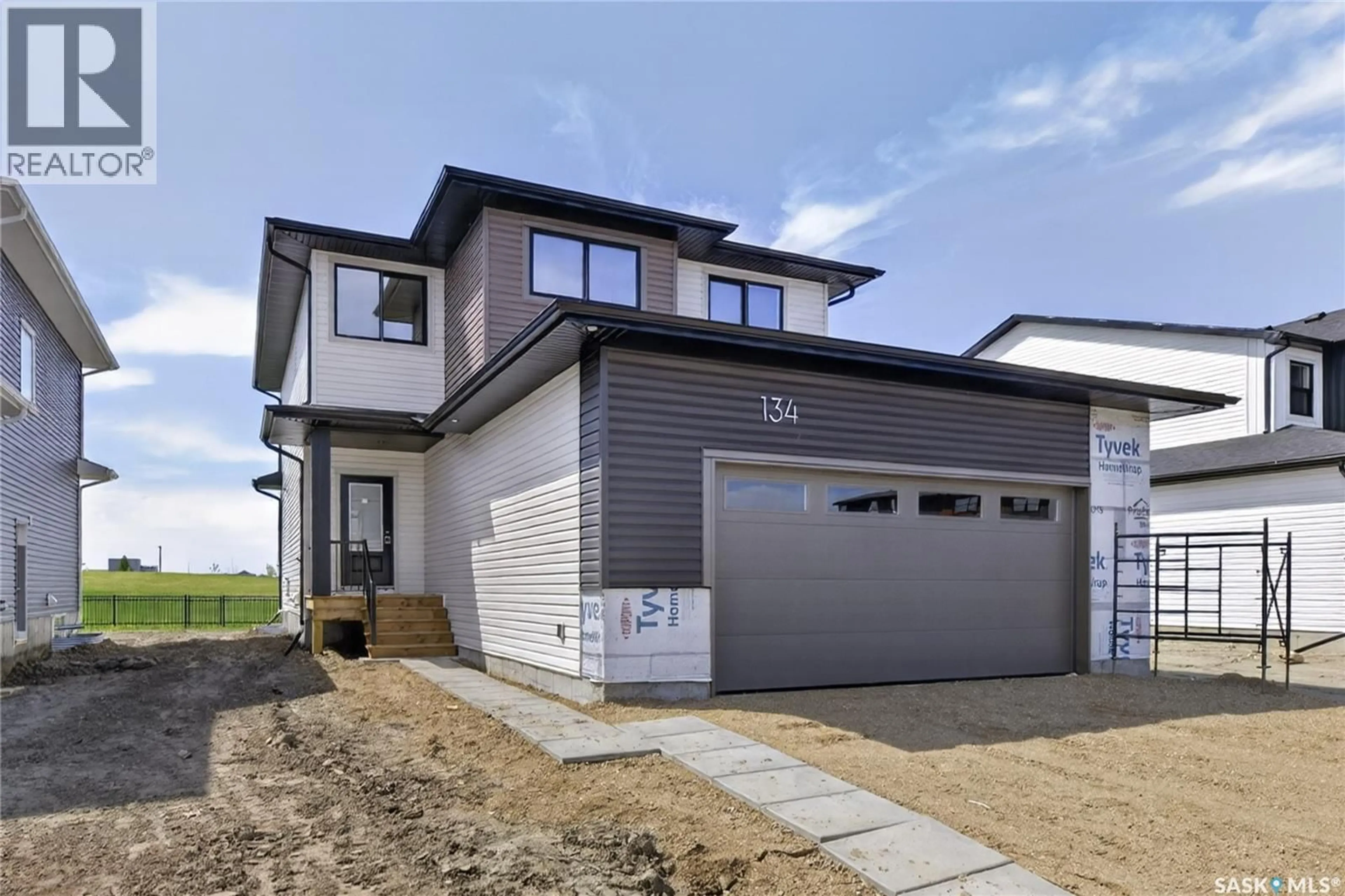 Home with vinyl exterior material, street for 134 EMMA CRESCENT, Martensville Saskatchewan S0K2T1