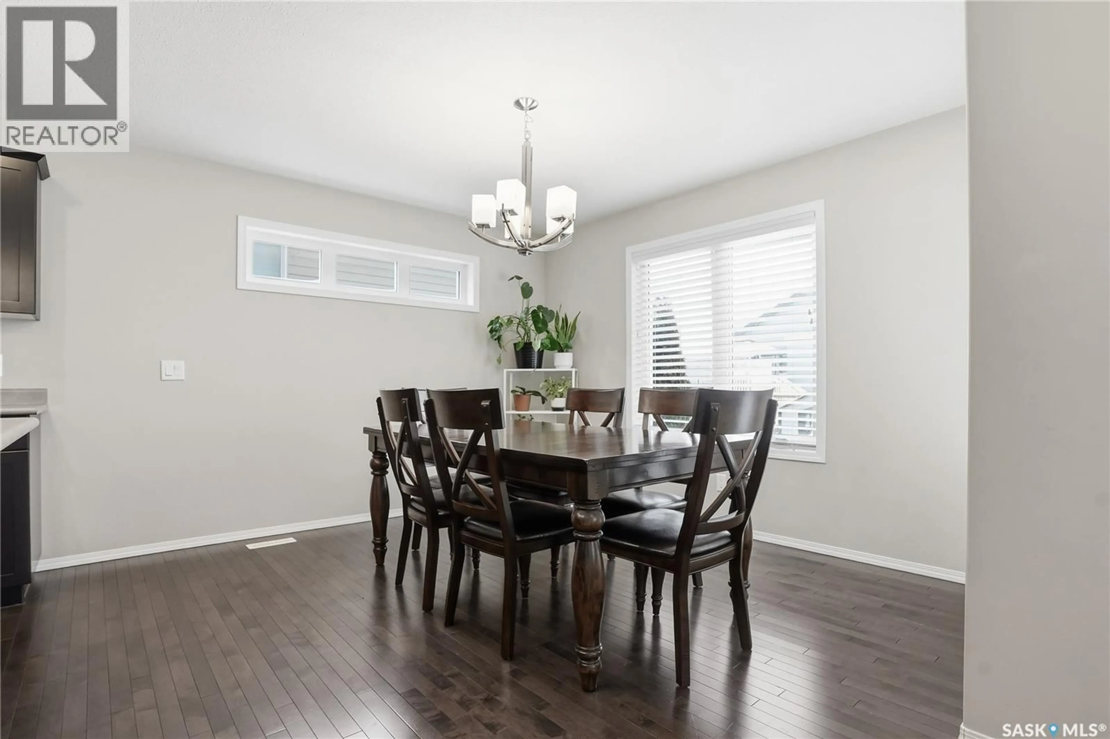 Dining room, wood/laminate floor for 366 KOLYNCHUK MANOR, Saskatoon Saskatchewan S7T0W4