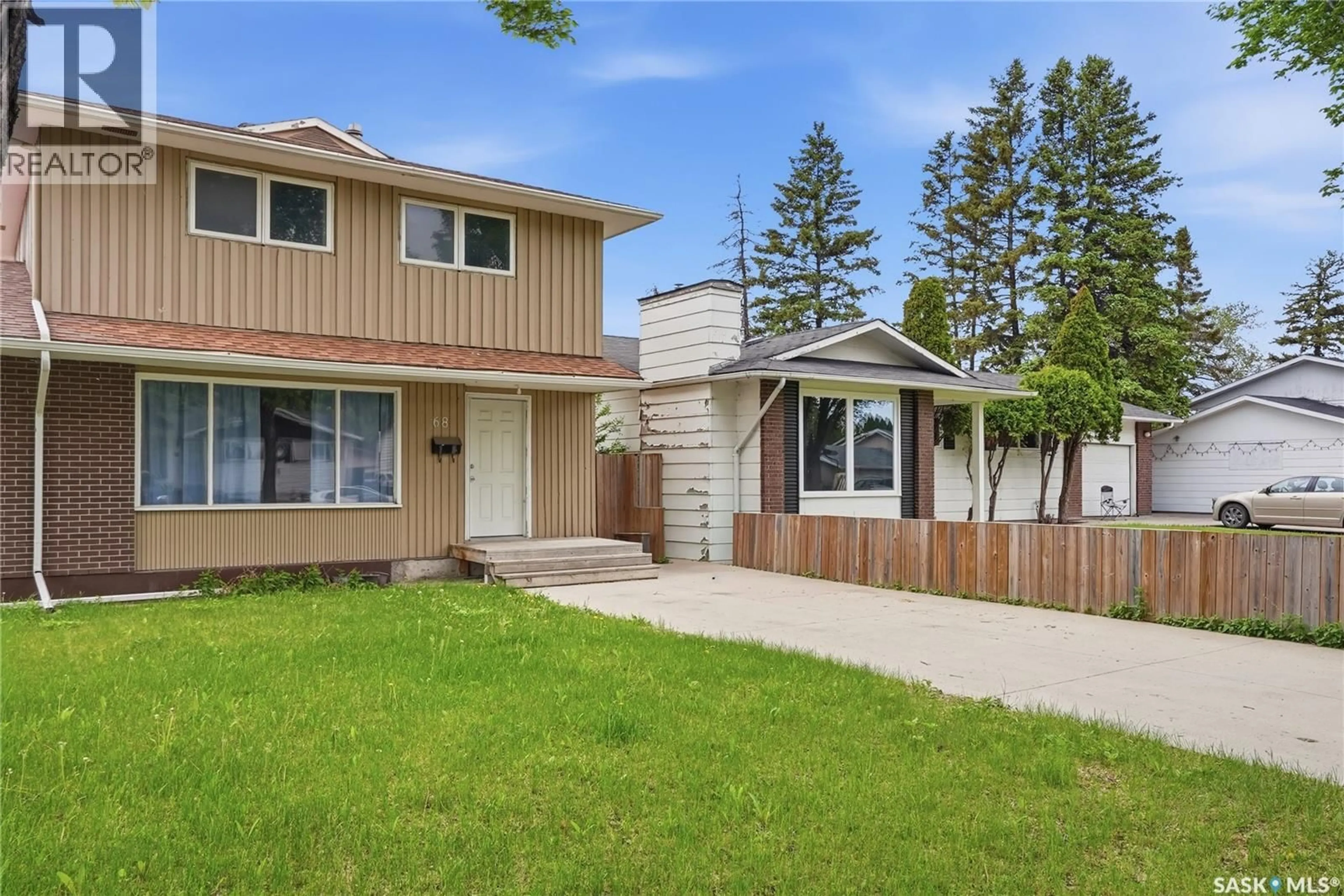 Home with vinyl exterior material, street for 68 CARLETON DRIVE, Saskatoon Saskatchewan S7H3N6