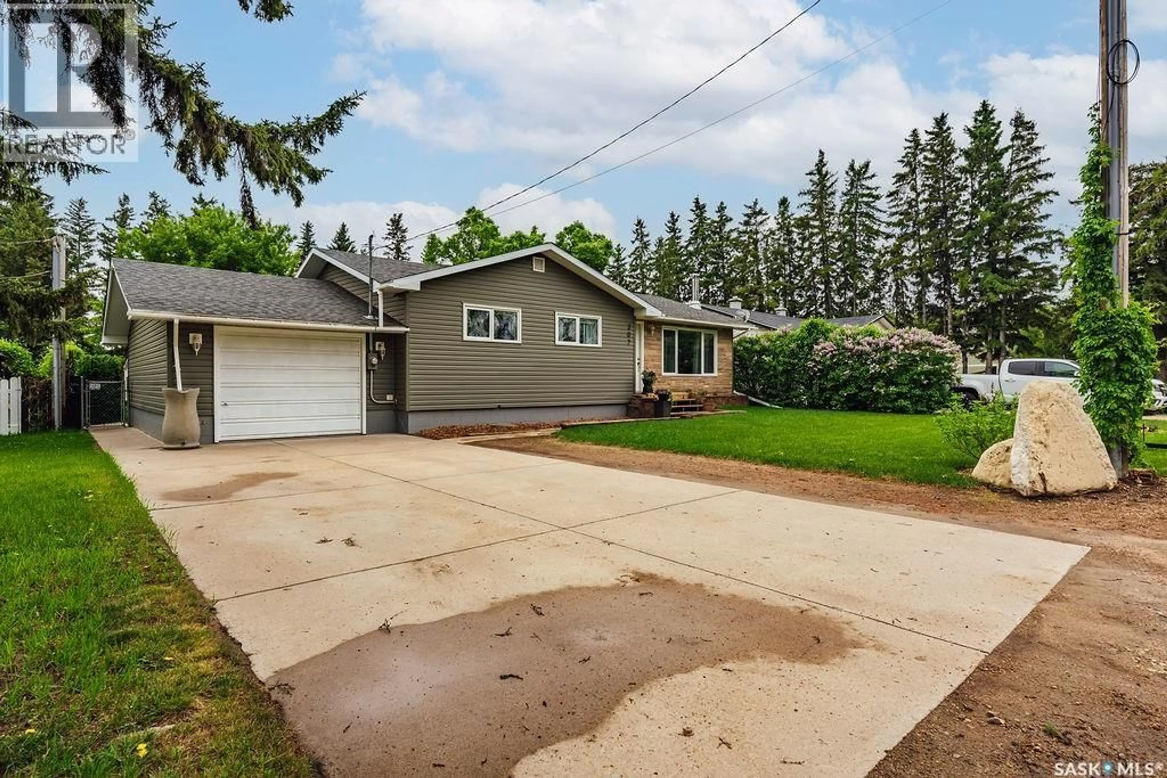 Home with vinyl exterior material, street for 307 2ND AVENUE, Hepburn Saskatchewan S0K1Z0