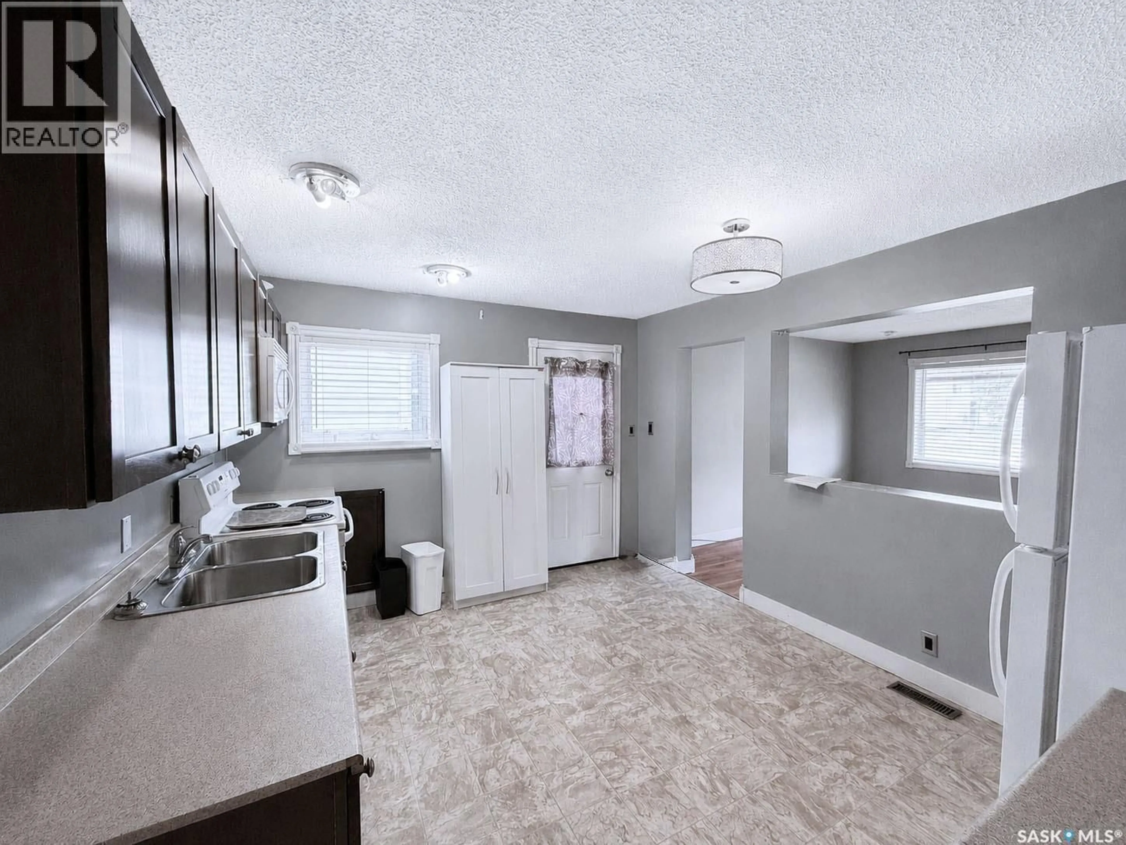 Open concept kitchen, unknown for 415 8TH STREET, Prince Albert Saskatchewan S6V0V8