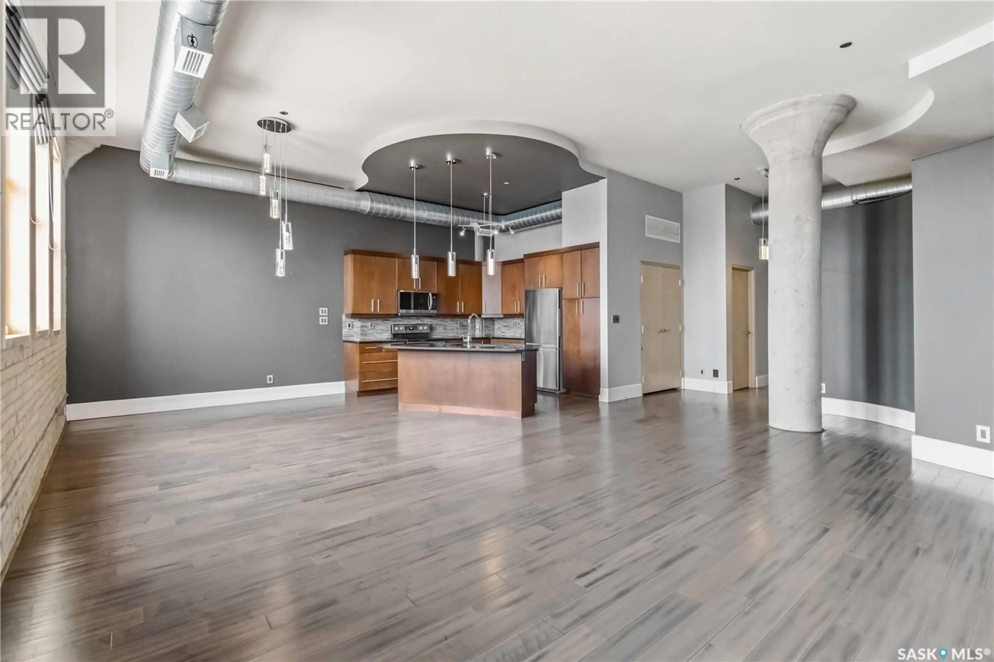 Open concept kitchen, unknown for E - 404 73 24TH STREET, Saskatoon Saskatchewan S7K0K3