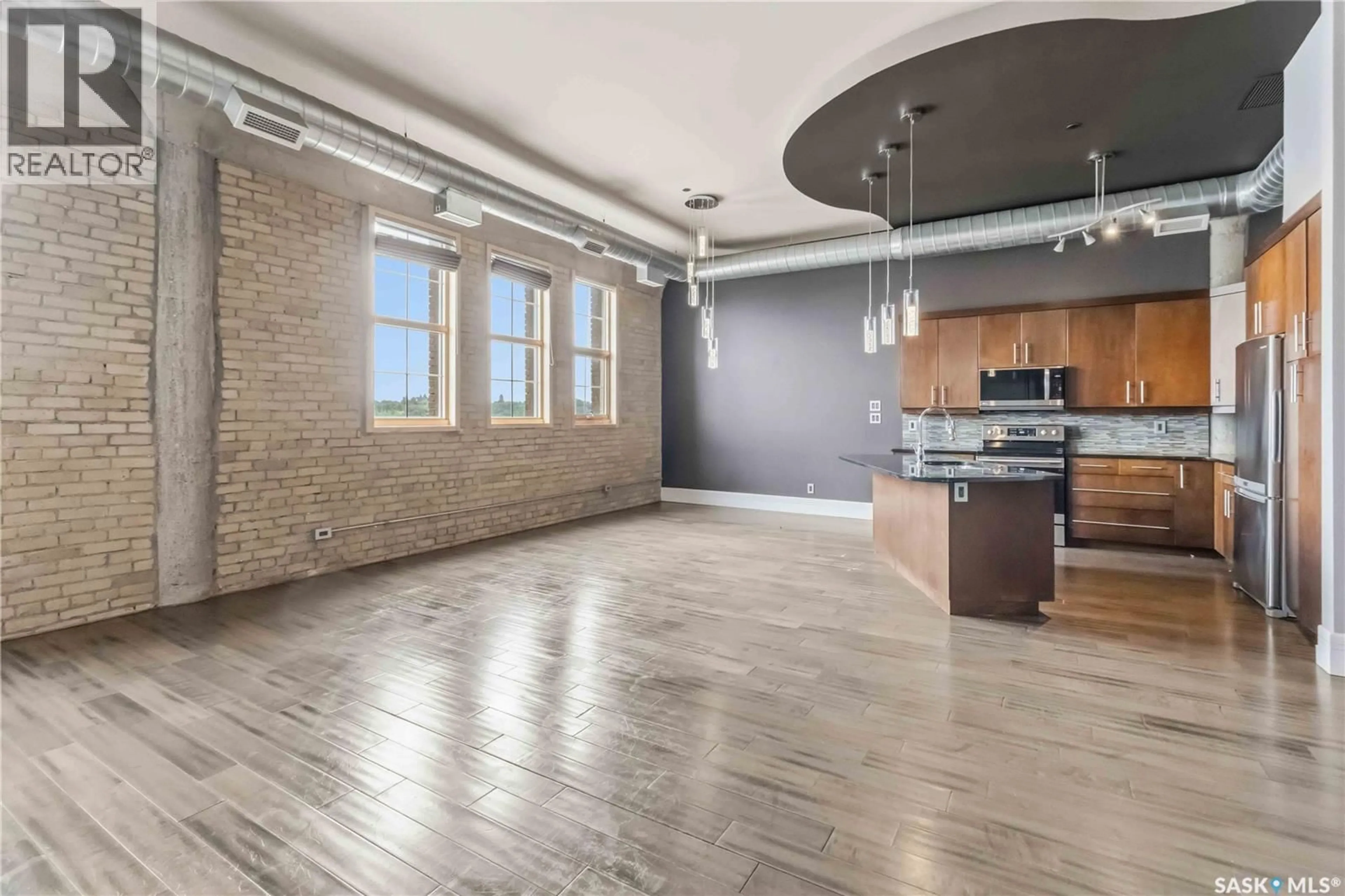 Open concept kitchen, unknown for E - 404 73 24TH STREET, Saskatoon Saskatchewan S7K0K3