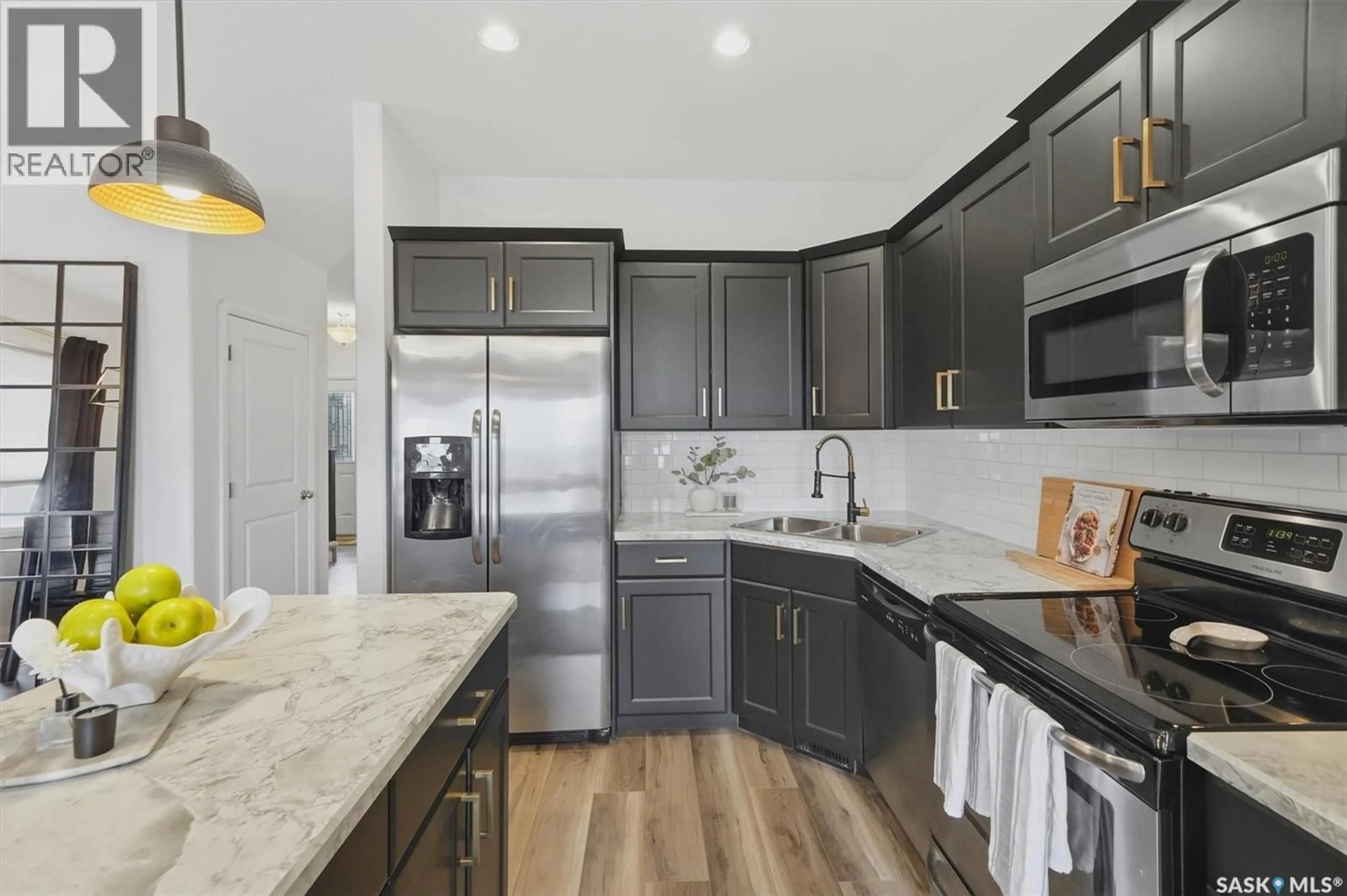 Open concept kitchen, ceramic/tile floor for 425 REDWOOD CRESCENT, Warman Saskatchewan S0K4S2