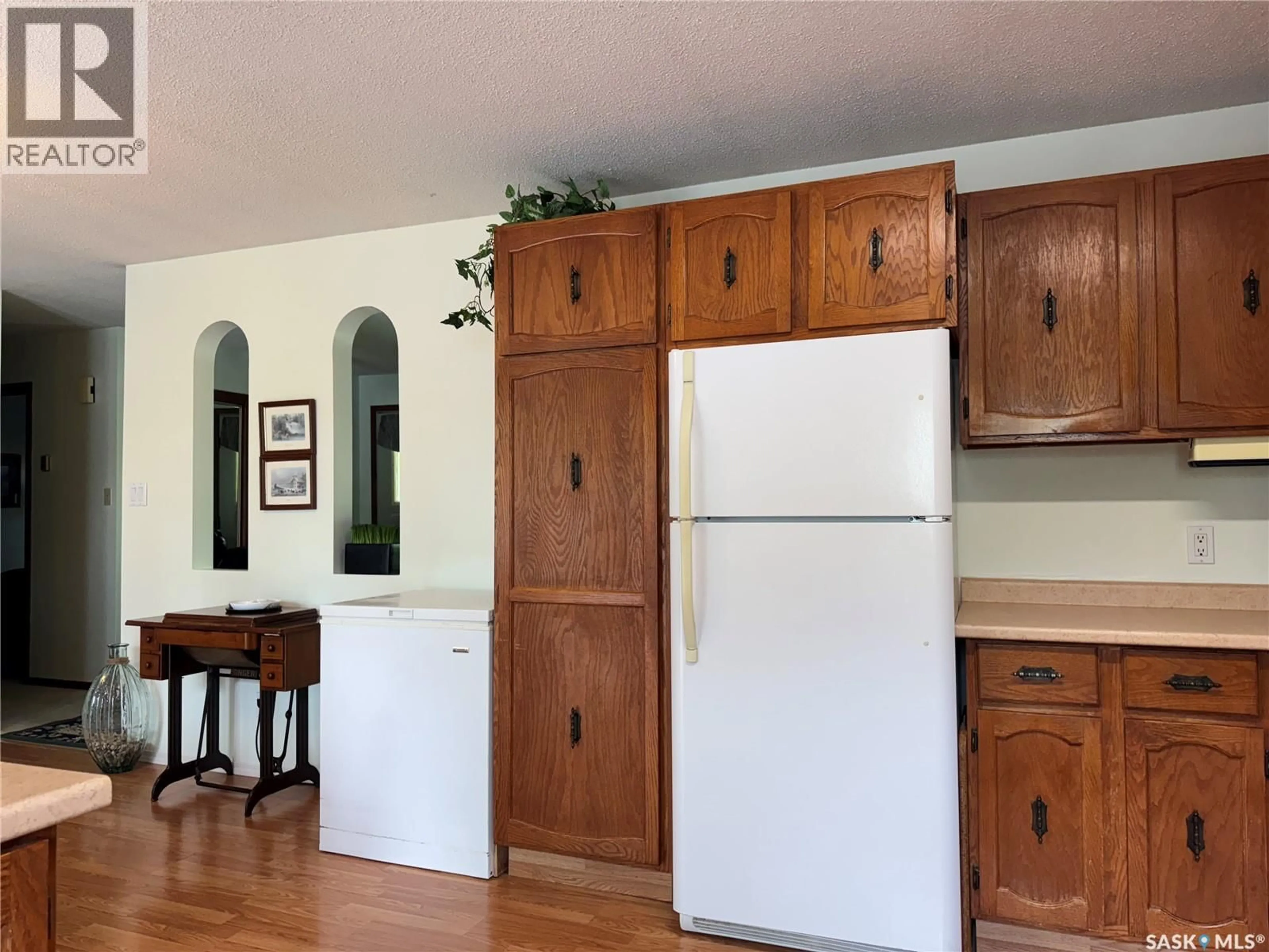 Standard kitchen, wood/laminate floor for 709 BROADWAY STREET, Foam Lake Saskatchewan S0A1A0