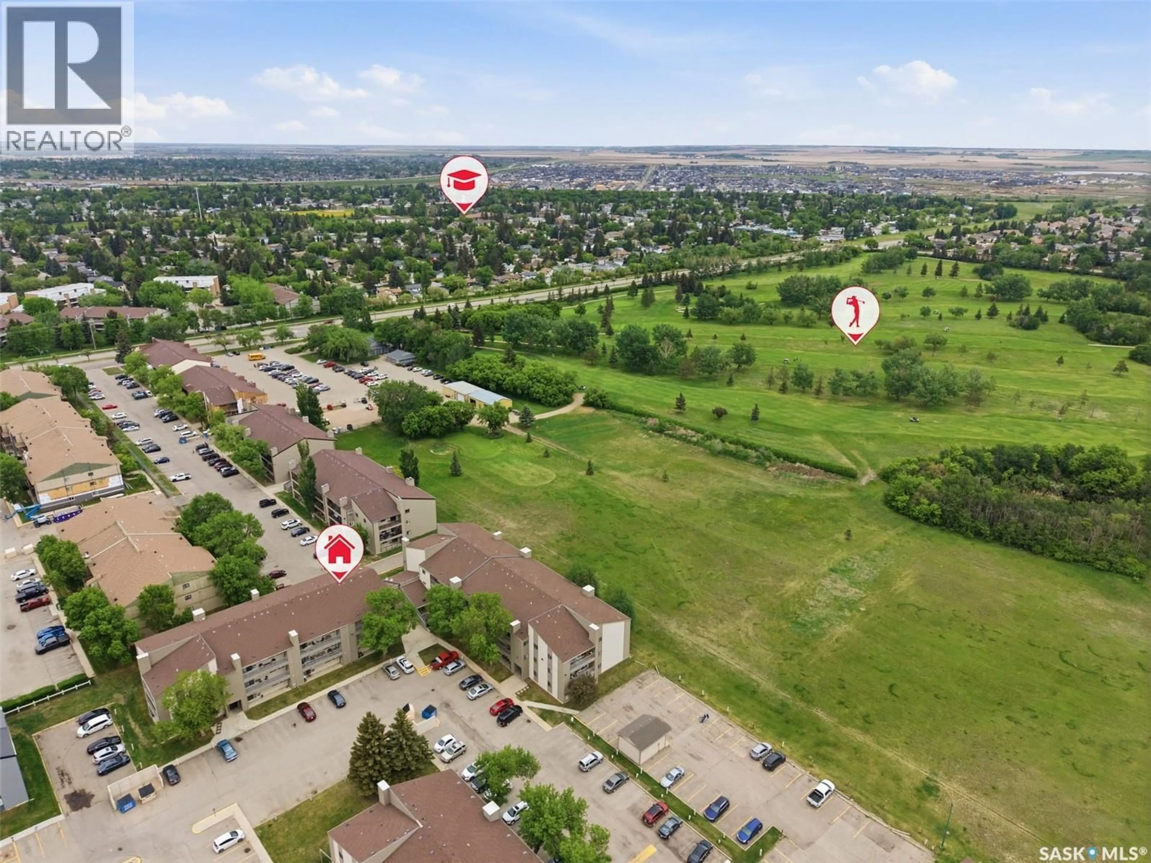 A pic from outside/outdoor area/front of a property/back of a property/a pic from drone, unknown for 207 - 307 TAIT PLACE, Saskatoon Saskatchewan S7H5L8