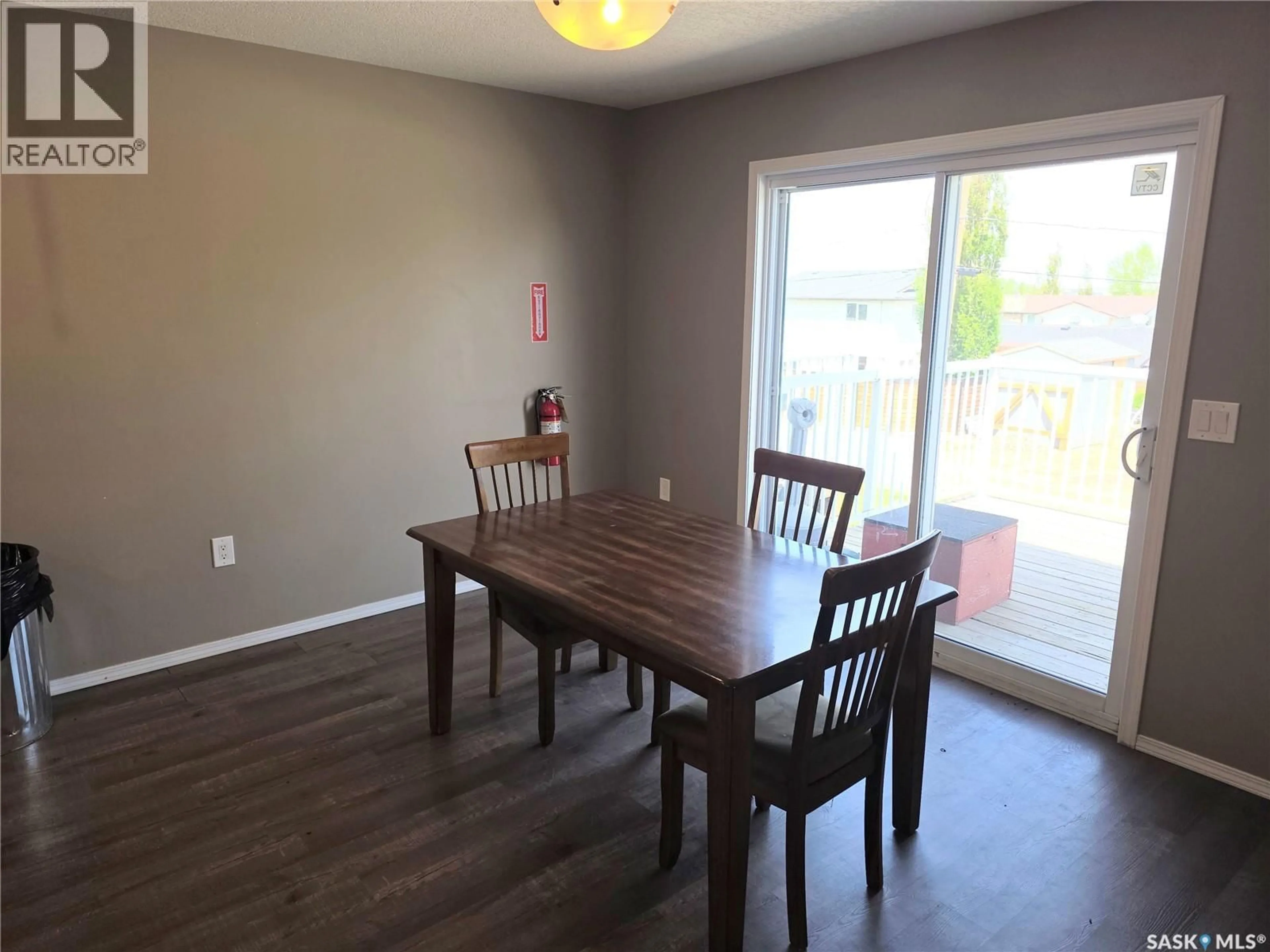 Dining room, wood/laminate floor for 712 COLUMBIA AVENUE, Kerrobert Saskatchewan S0L1R0