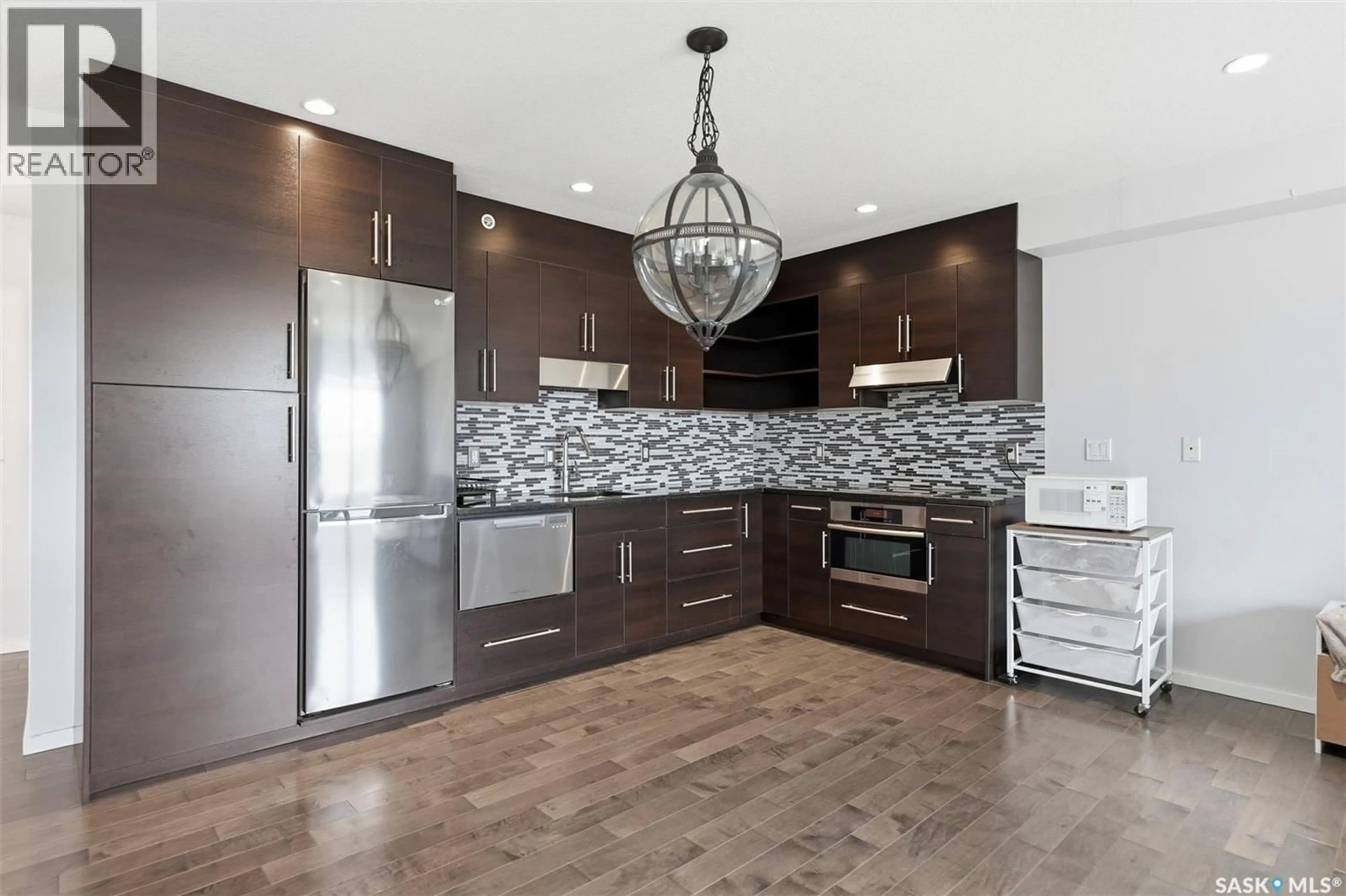 Open concept kitchen, unknown for 230 - 410 SLIMMON ROAD, Saskatoon Saskatchewan S7V0B3