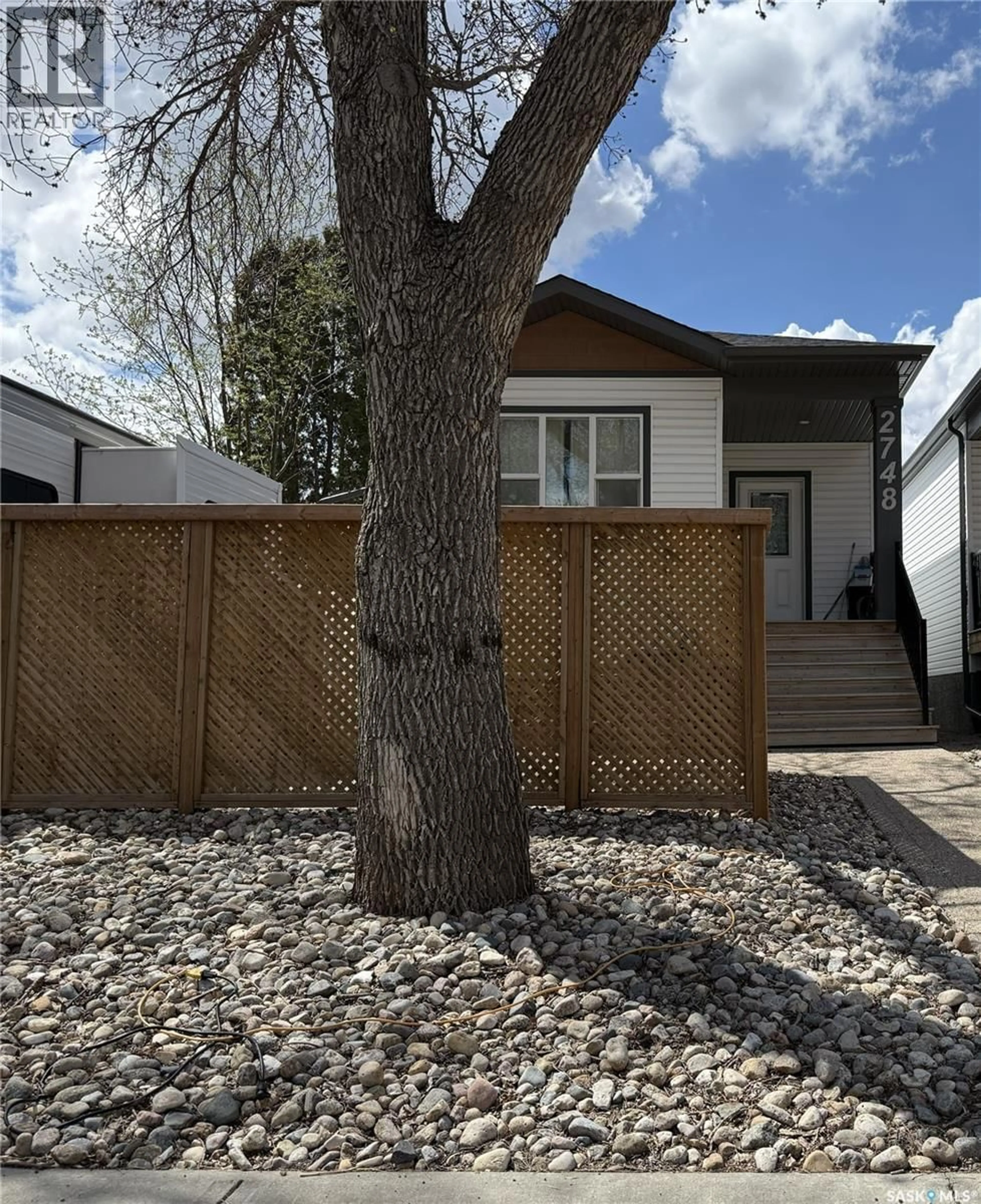 Home with vinyl exterior material, street for 2748 MACKAY STREET, Regina Saskatchewan S4N2T7