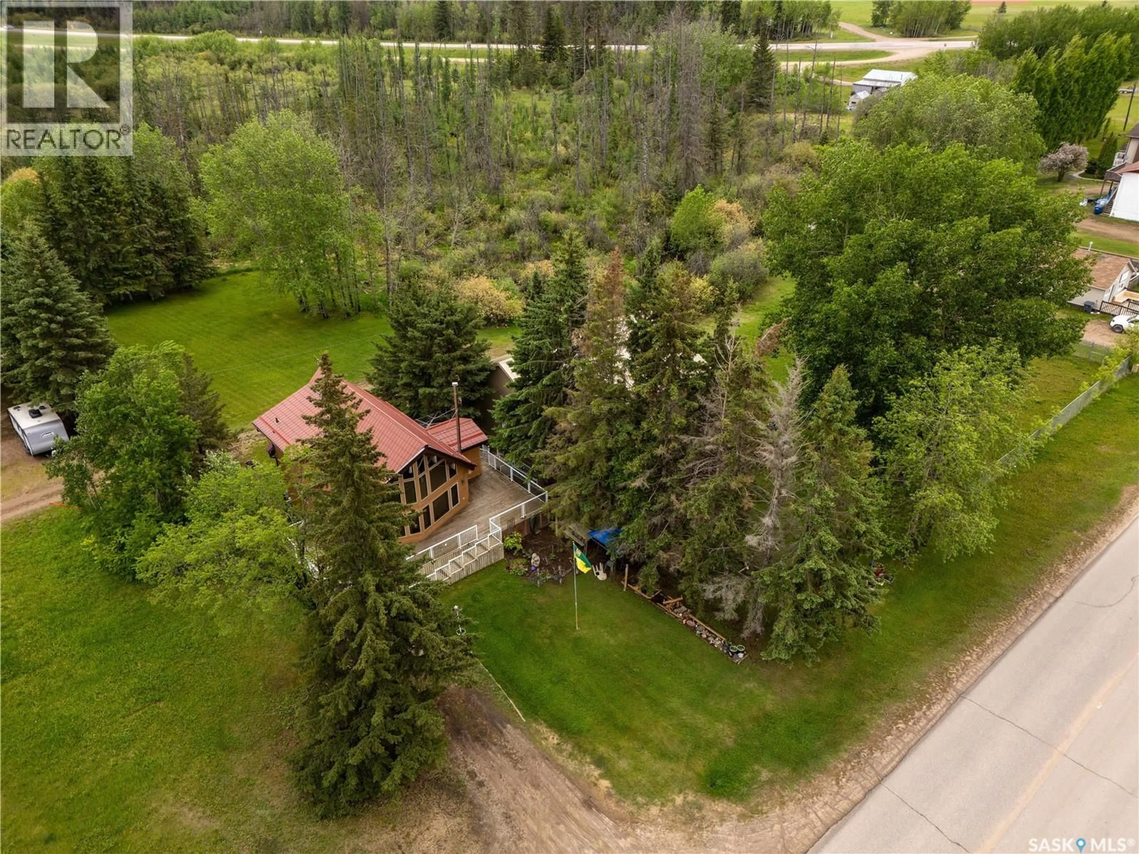 A pic from outside/outdoor area/front of a property/back of a property/a pic from drone, forest/trees view for 228 MAIN STREET, Pierceland Saskatchewan S0M2K0