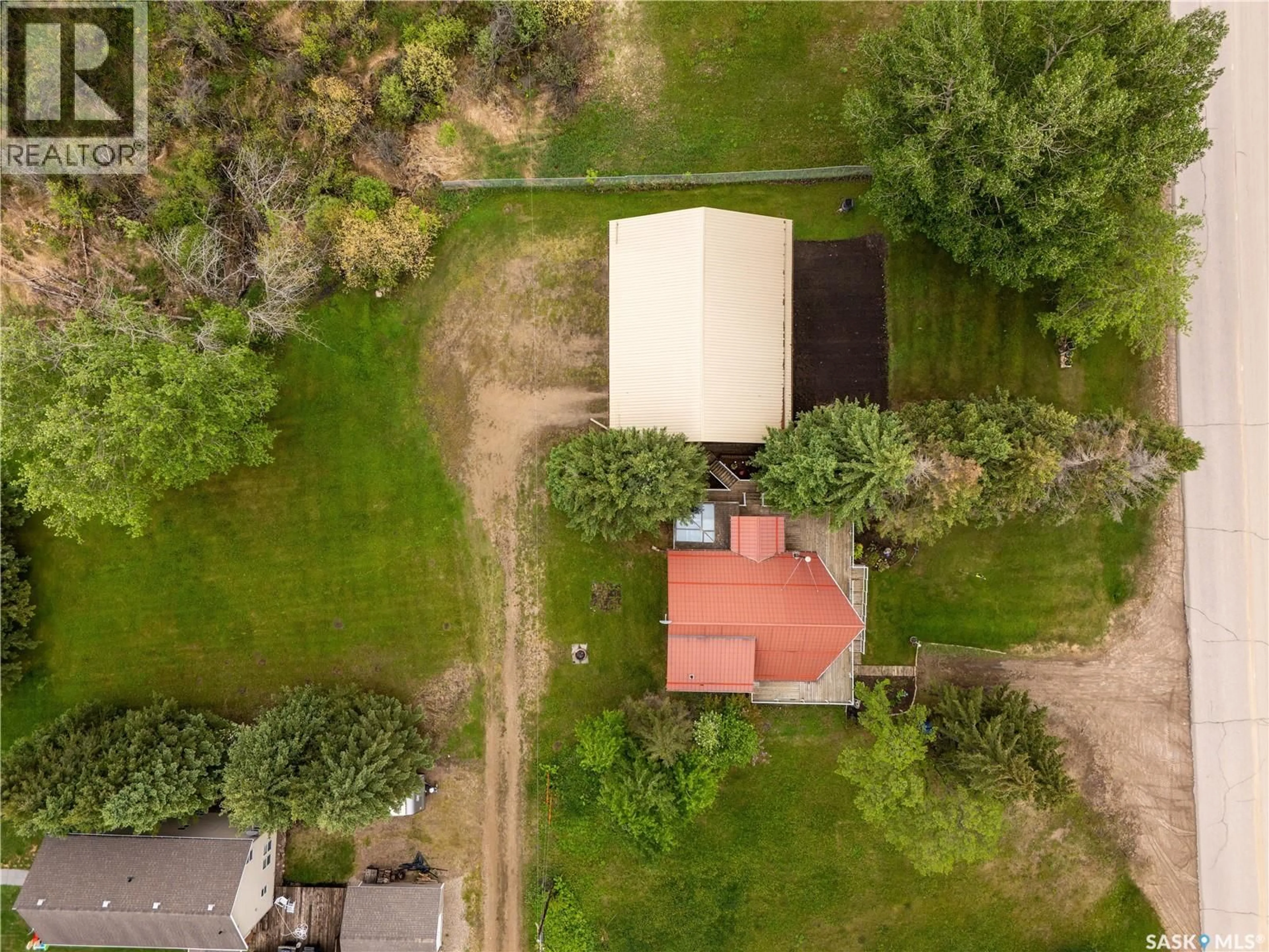 A pic from outside/outdoor area/front of a property/back of a property/a pic from drone, building for 228 MAIN STREET, Pierceland Saskatchewan S0M2K0