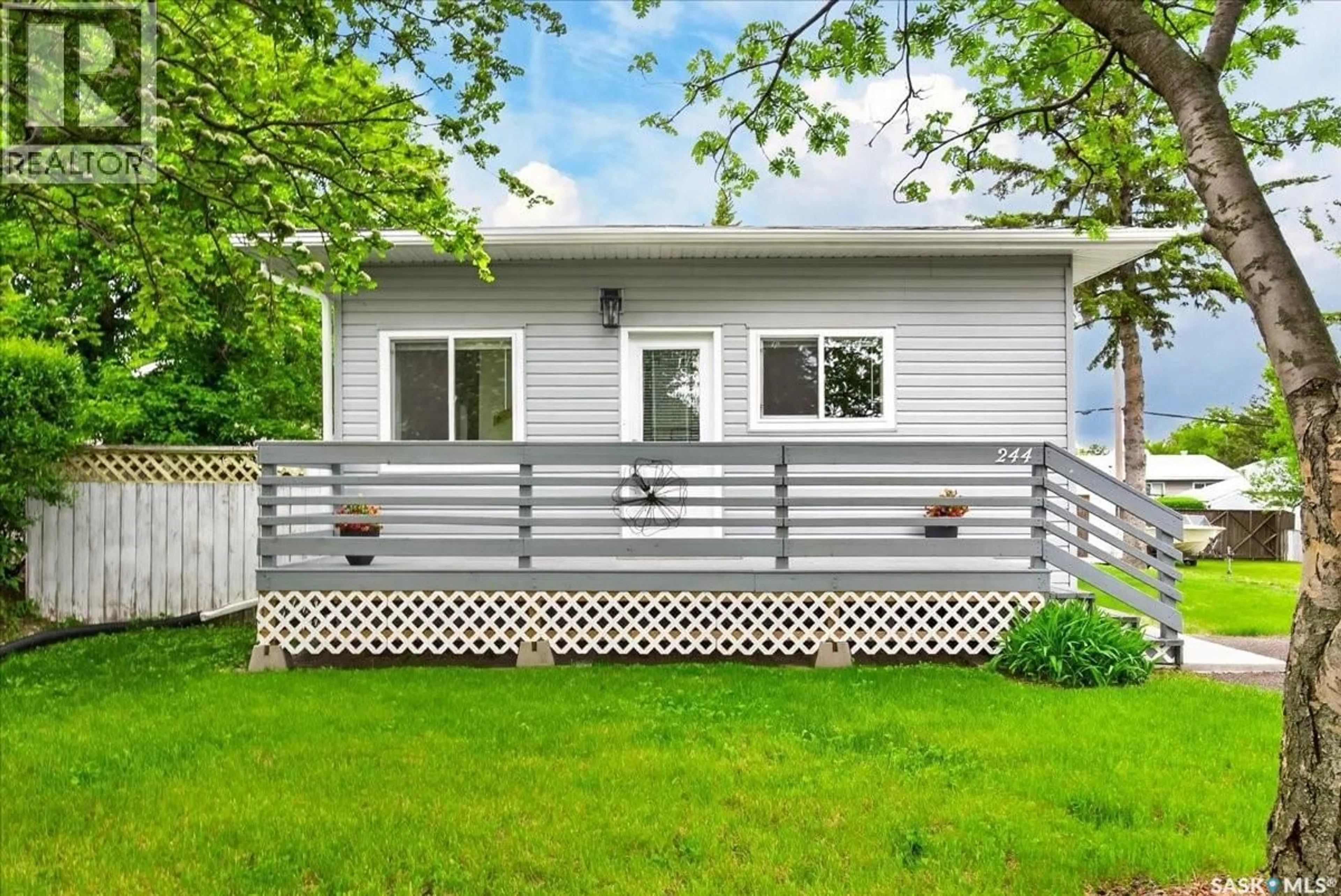 Home with vinyl exterior material, street for 244 MAIN STREET, Balgonie Saskatchewan S0G0E0