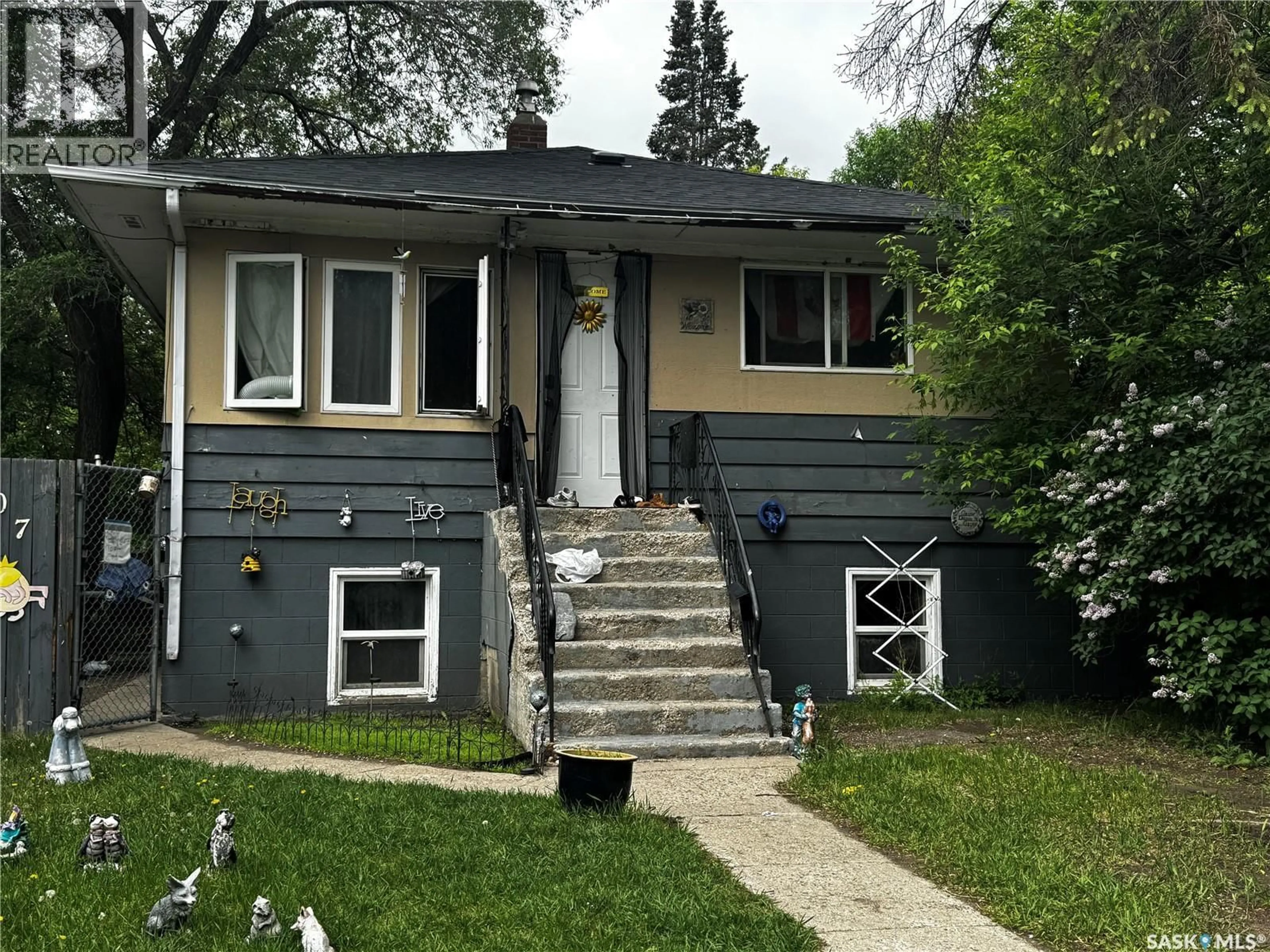 Home with vinyl exterior material, street for 807 WELDON AVENUE, Saskatoon Saskatchewan S7M2V3