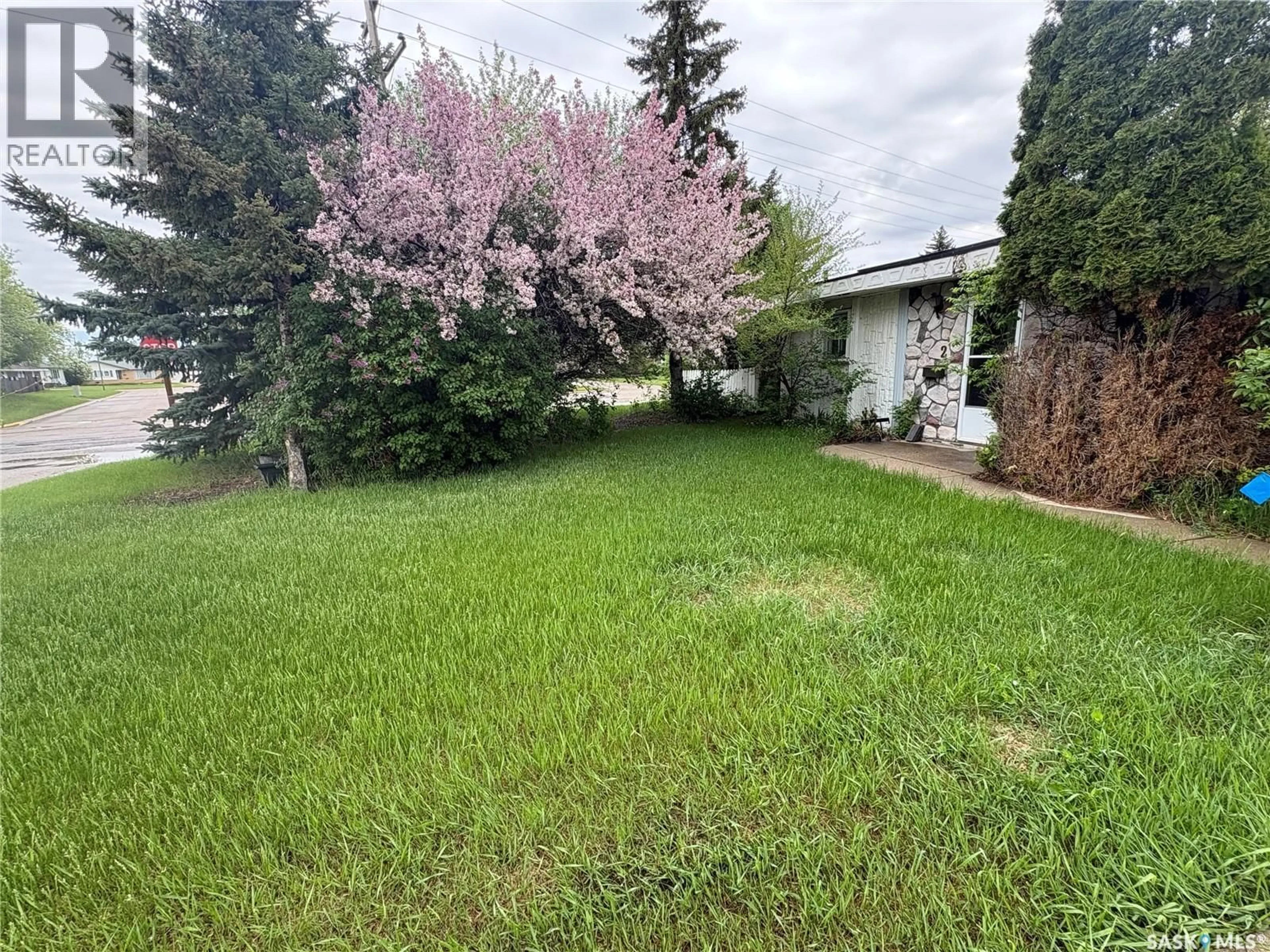 A pic from outside/outdoor area/front of a property/back of a property/a pic from drone, street for 2 GARVIN BAY, Melville Saskatchewan S0A2P0