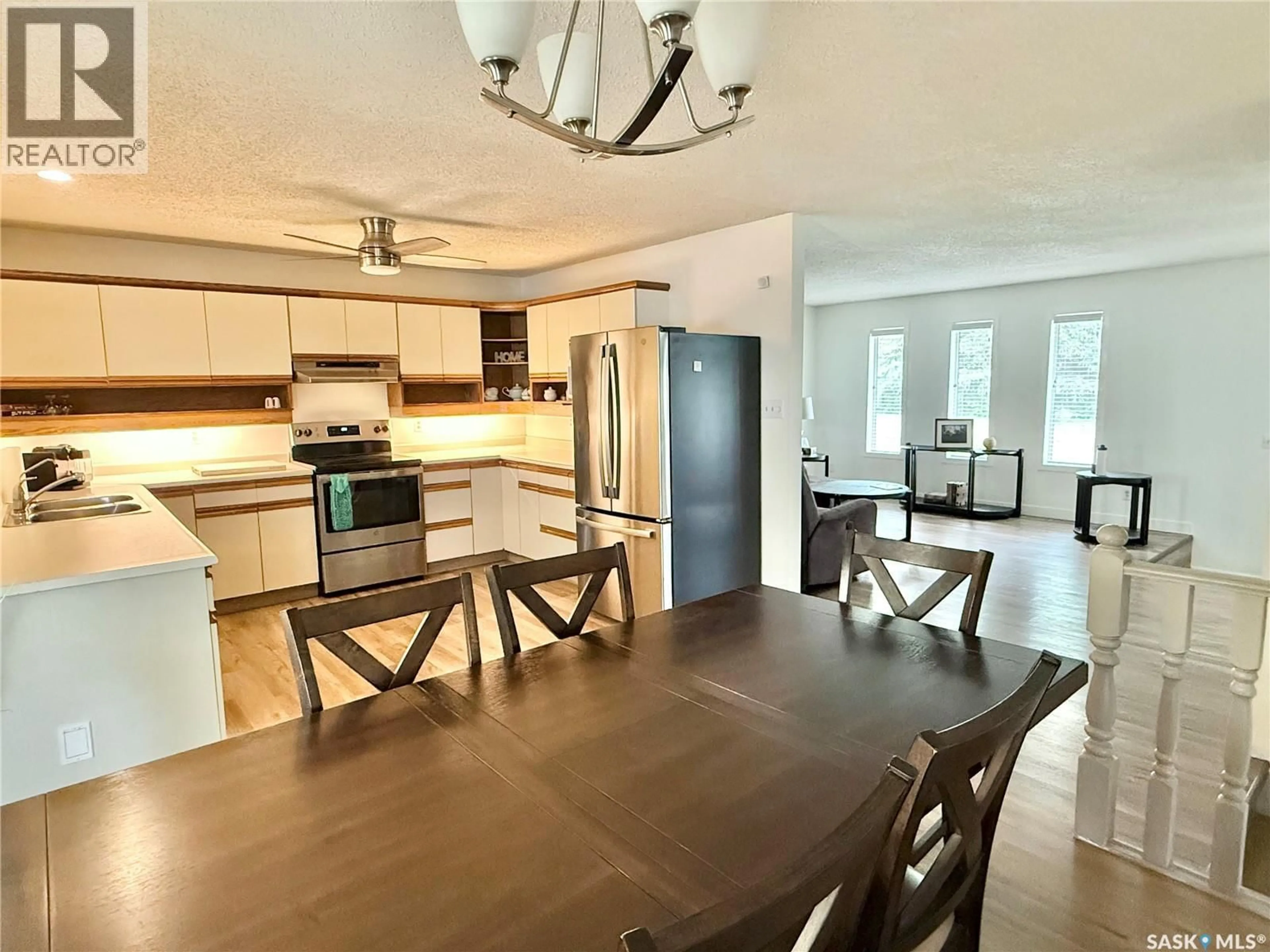Open concept kitchen, wood/laminate floor for 405 3RD AVENUE, Leask Saskatchewan S0J1M0