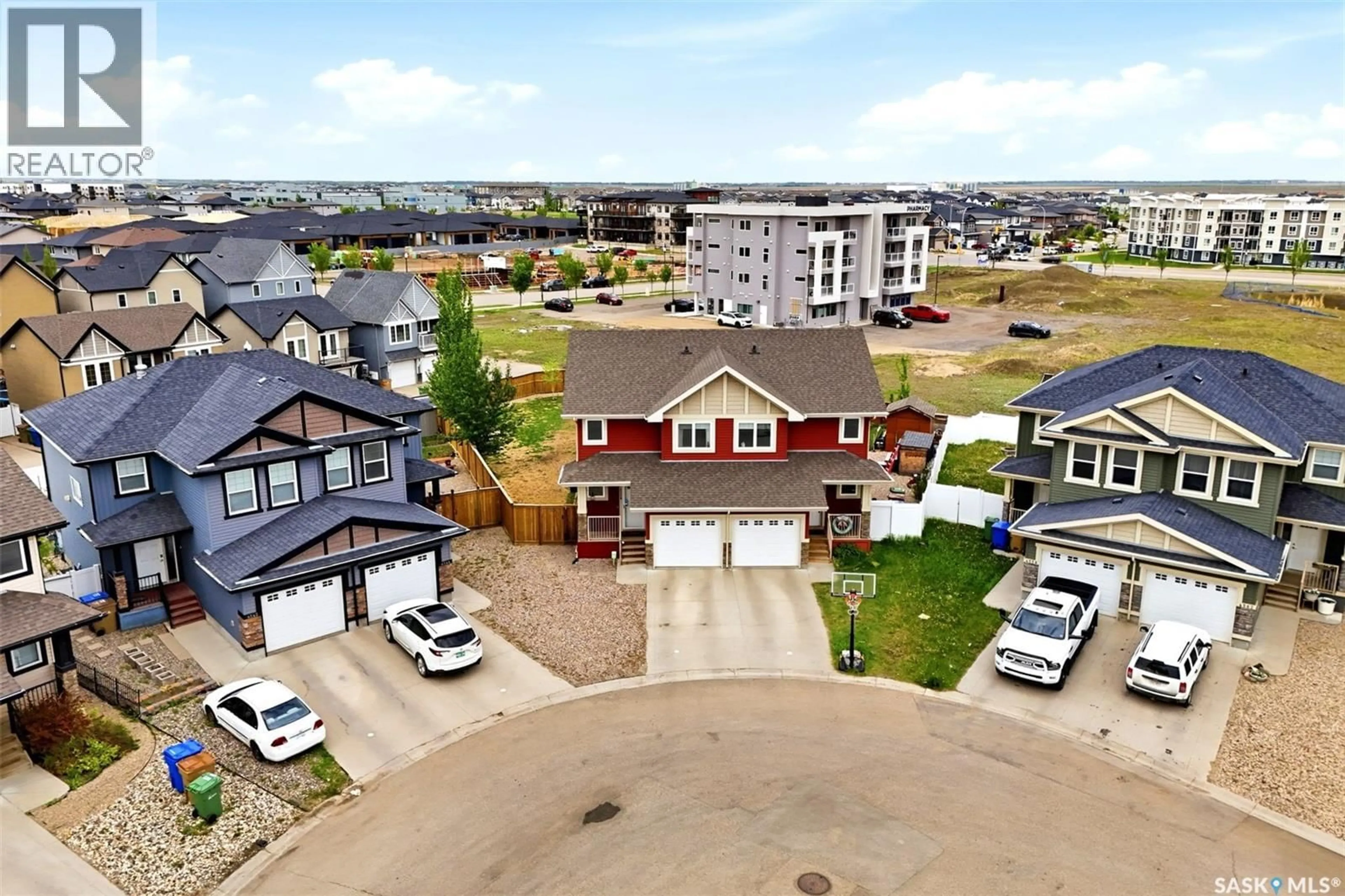 A pic from outside/outdoor area/front of a property/back of a property/a pic from drone, unknown for 4550 GREEN POPLAR LANE, Regina Saskatchewan S4V3H6