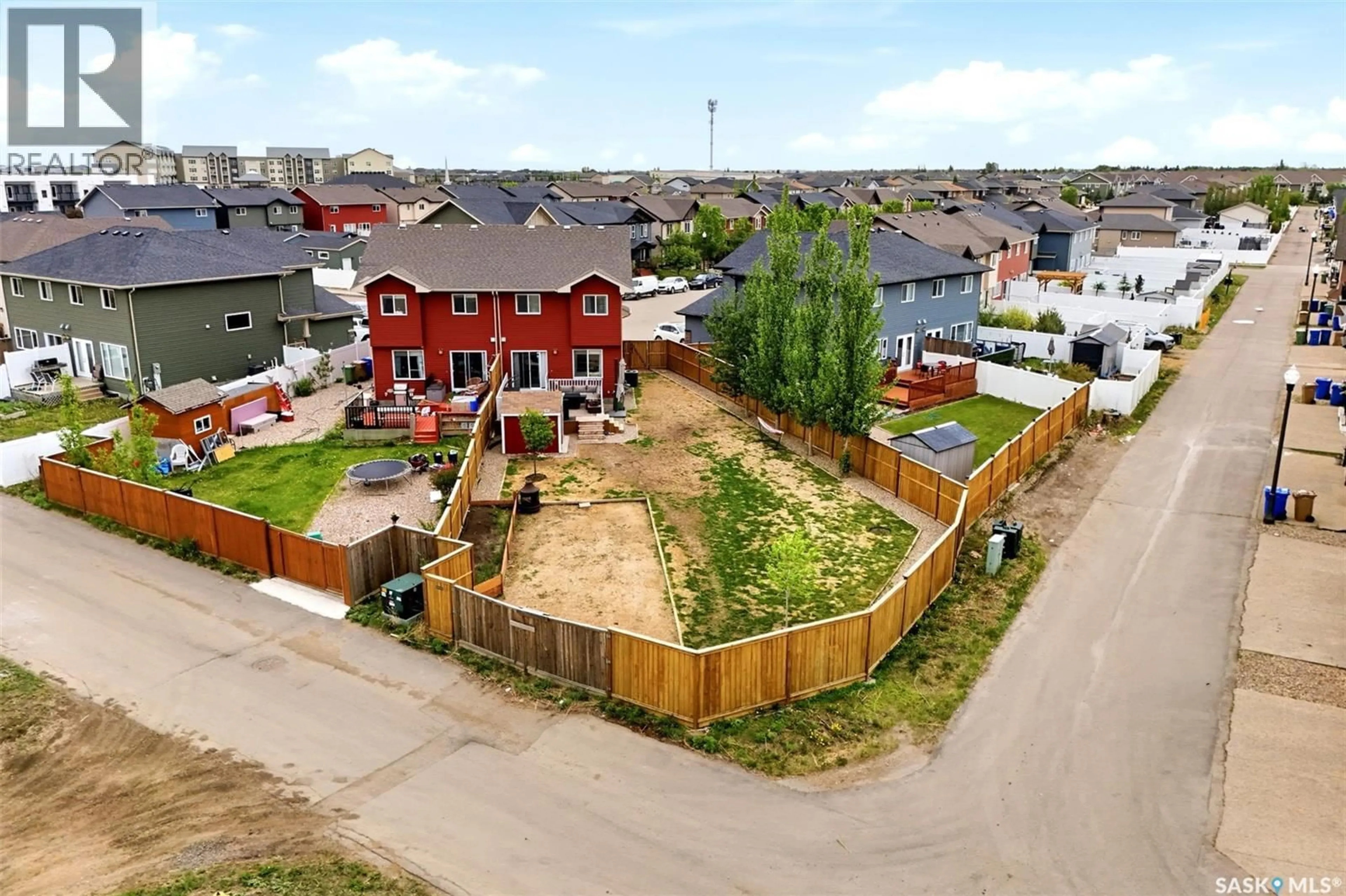 A pic from outside/outdoor area/front of a property/back of a property/a pic from drone, street for 4550 GREEN POPLAR LANE, Regina Saskatchewan S4V3H6